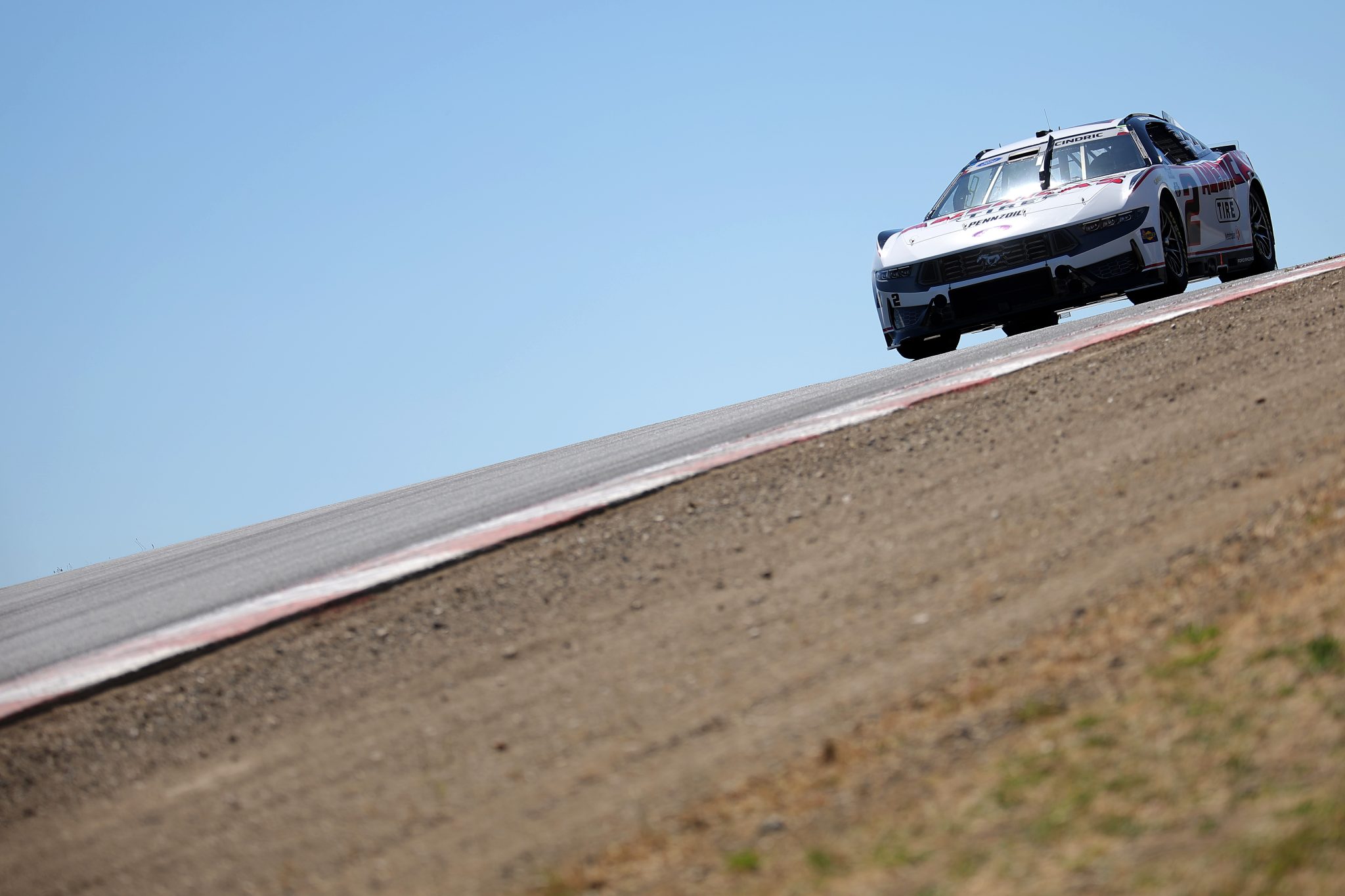 SONOMA, CALIFORNIA - JUNE 27: Austin Cindric, driver of the #2 America's Tire Ford, drives during practice for the NASCAR Cup Series Toyota/Save Mart 350 at Sonoma Raceway on June 27, 2026 in Sonoma, California. (Photo by Jonathan Bachman/Getty Images) | Getty Images