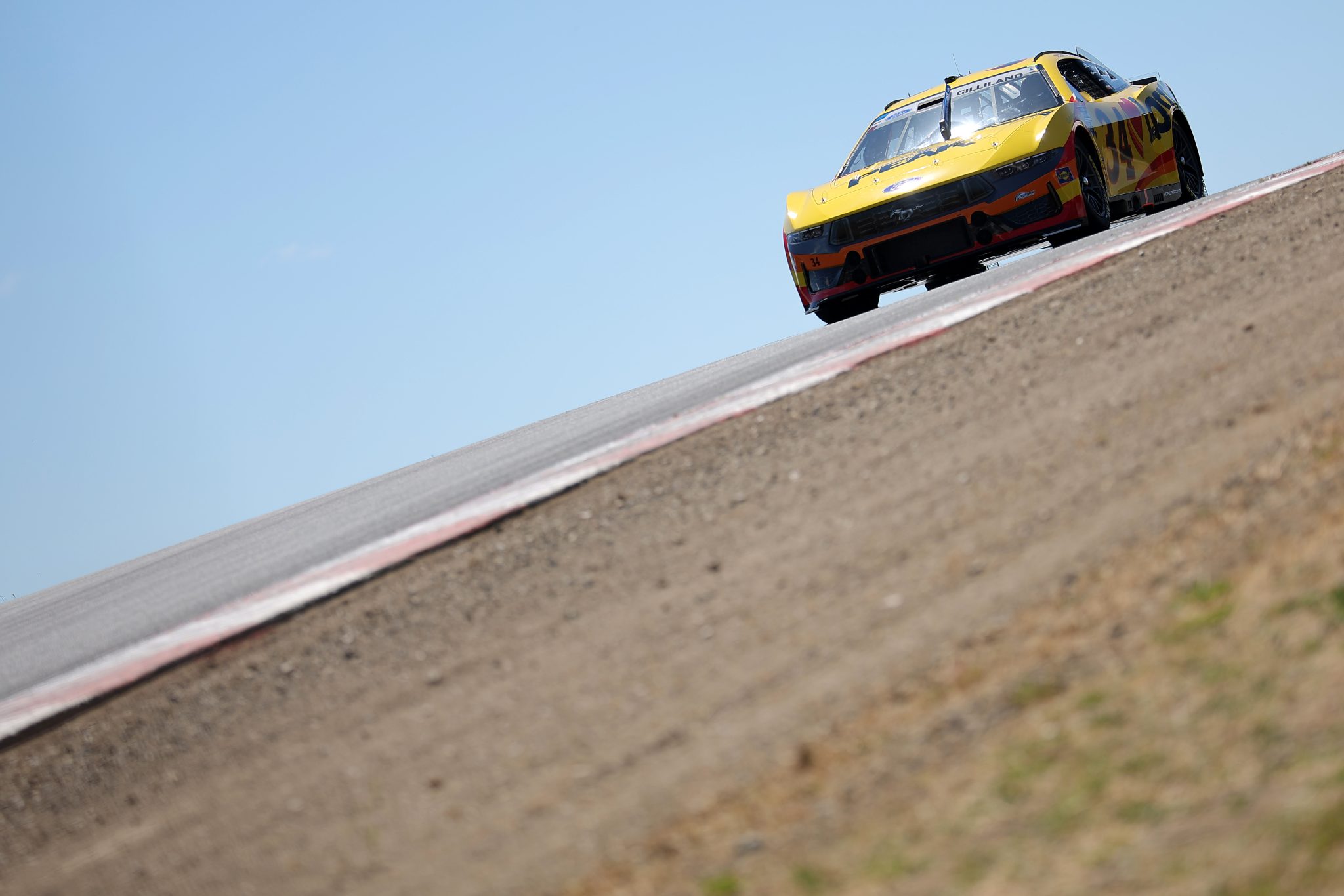 SONOMA, CALIFORNIA - JUNE 27: Todd Gilliland, driver of the #34 Love's Travel Stops/PEAK Ford, drives during practice for the NASCAR Cup Series Toyota/Save Mart 350 at Sonoma Raceway on June 27, 2026 in Sonoma, California. (Photo by Jonathan Bachman/Getty Images) | Getty Images