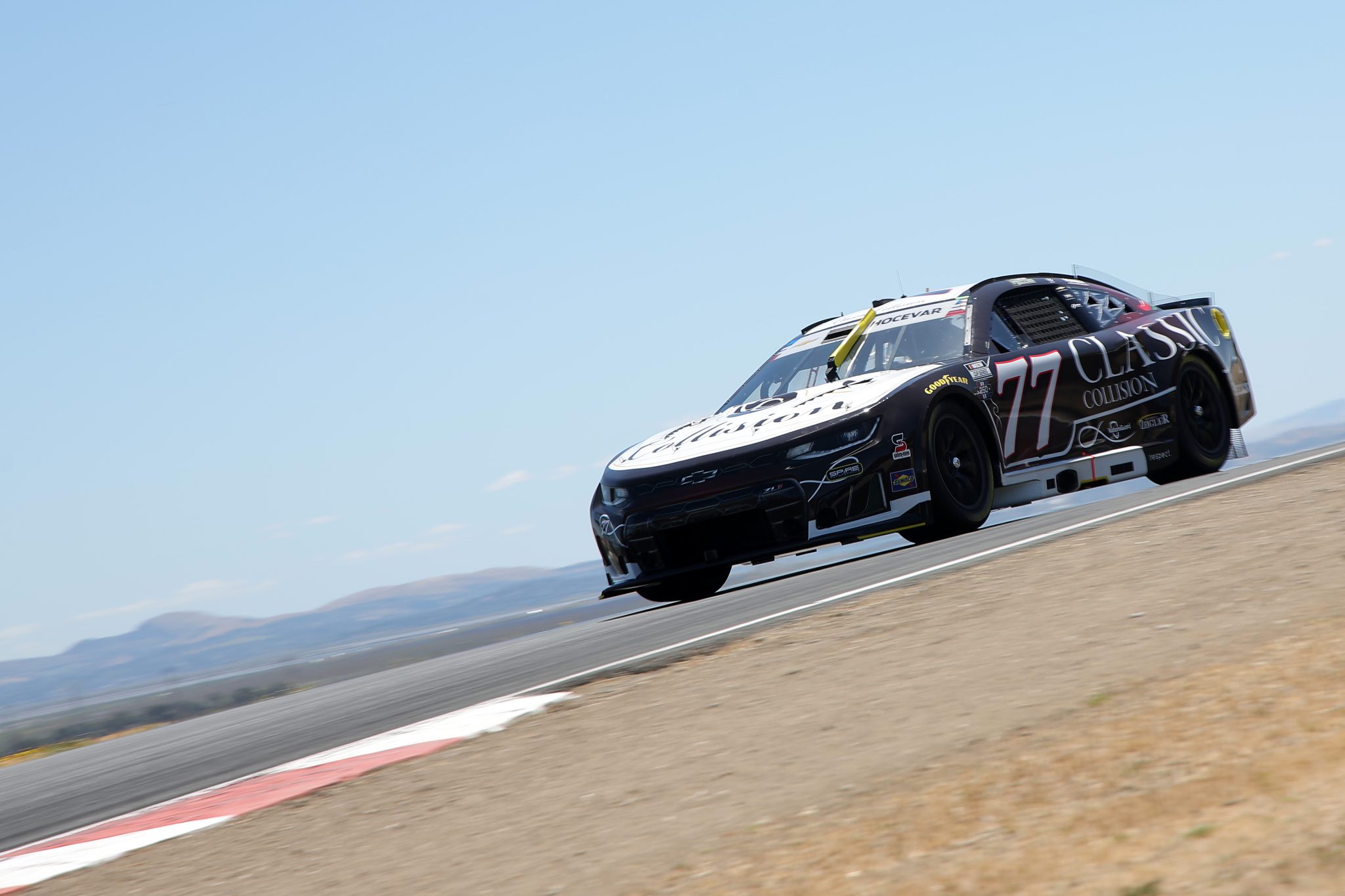 SONOMA, CALIFORNIA - JUNE 27: Carson Hocevar, driver of the #77 Classic Collision Chevrolet, drives during practice for the NASCAR Cup Series Toyota/Save Mart 350 at Sonoma Raceway on June 27, 2026 in Sonoma, California. (Photo by Jonathan Bachman/Getty Images) | Getty Images