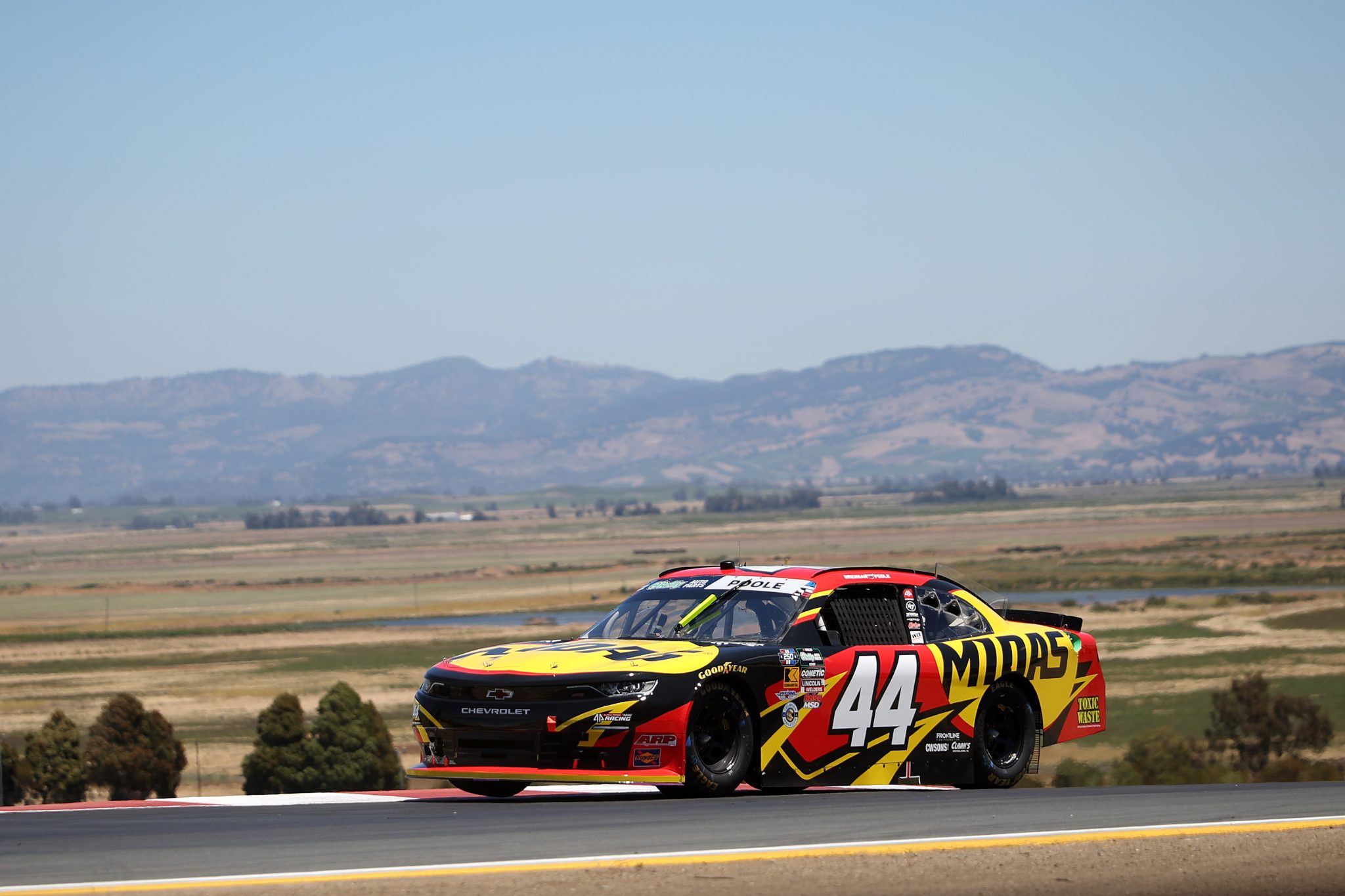SONOMA, CALIFORNIA - JUNE 26: Brennan Poole, driver of the #44 Midas Chevrolet, drives during practice for the NASCAR O'Reilly Auto Parts Series Pit Boss/FoodMaxx 250 at Sonoma Raceway on June 26, 2026 in Sonoma, California. (Photo by James Gilbert/Getty Images) | Getty Images