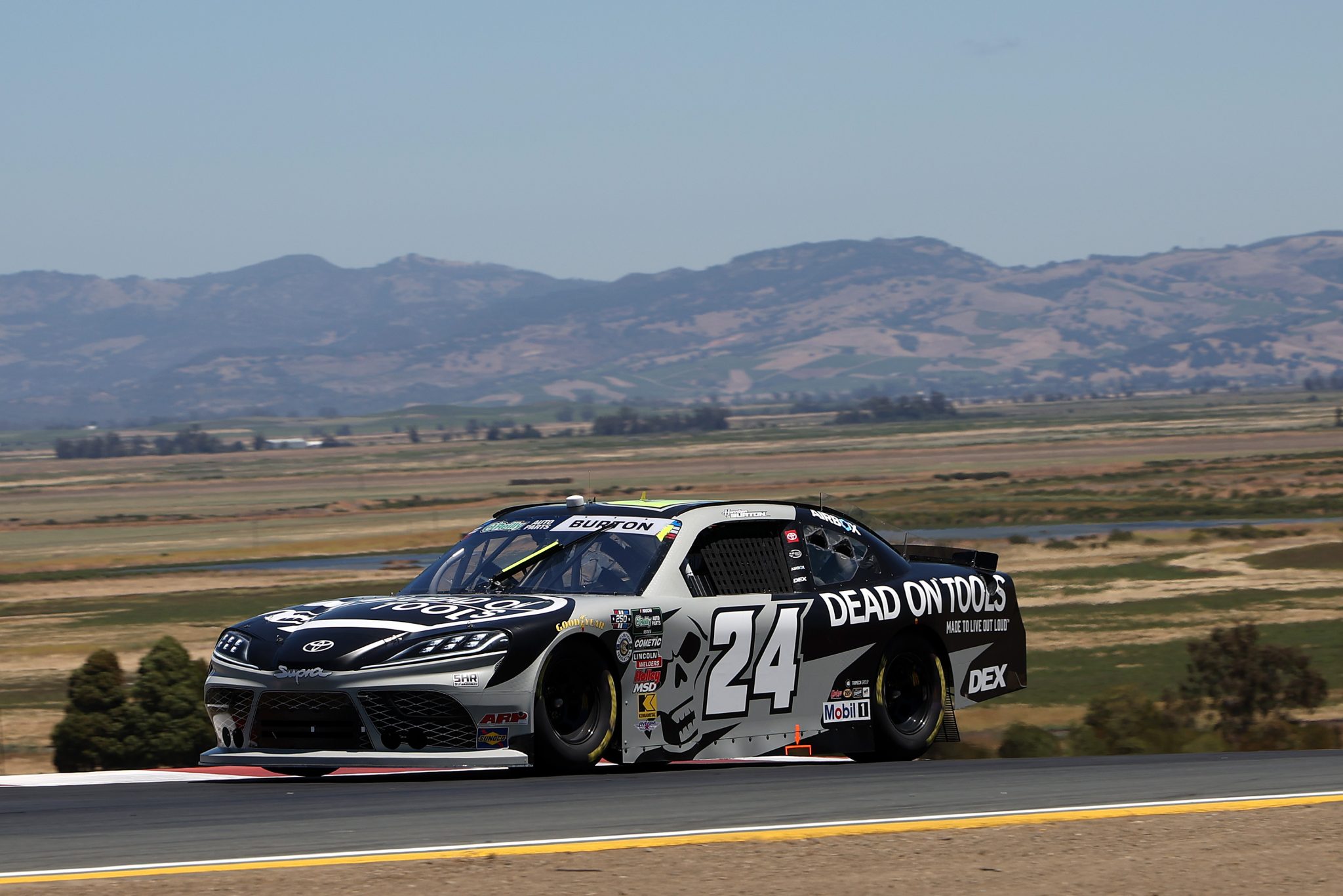 SONOMA, CALIFORNIA - JUNE 26: Harrison Burton, driver of the #24 Dead On Tools Toyota, drives during practice for the NASCAR O'Reilly Auto Parts Series Pit Boss/FoodMaxx 250 at Sonoma Raceway on June 26, 2026 in Sonoma, California. (Photo by James Gilbert/Getty Images) | Getty Images