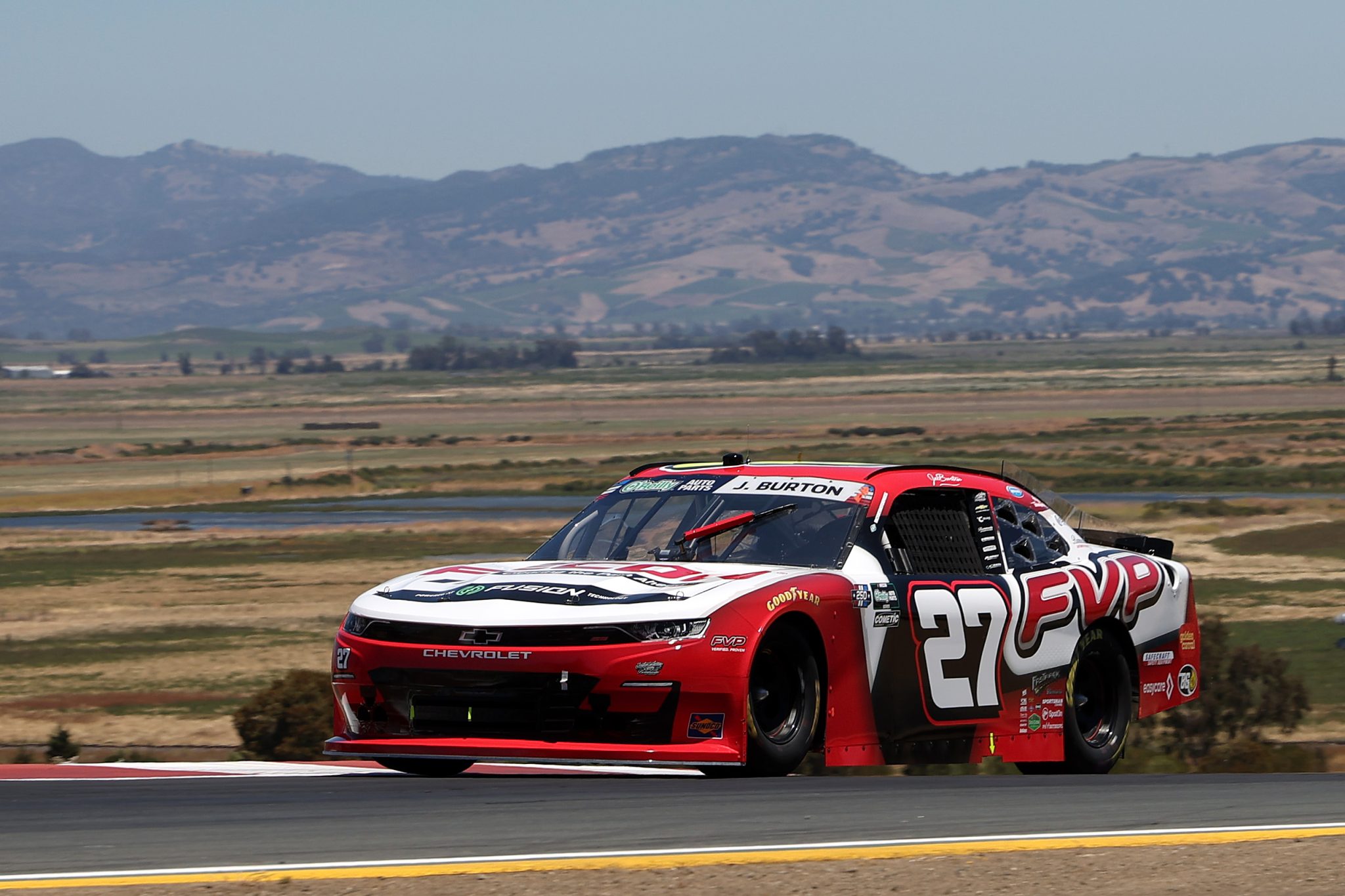 SONOMA, CALIFORNIA - JUNE 26: Jeb Burton, driver of the #27 FVP/FECON Chevrolet, drives during practice for the NASCAR O'Reilly Auto Parts Series Pit Boss/FoodMaxx 250 at Sonoma Raceway on June 26, 2026 in Sonoma, California. (Photo by James Gilbert/Getty Images) | Getty Images