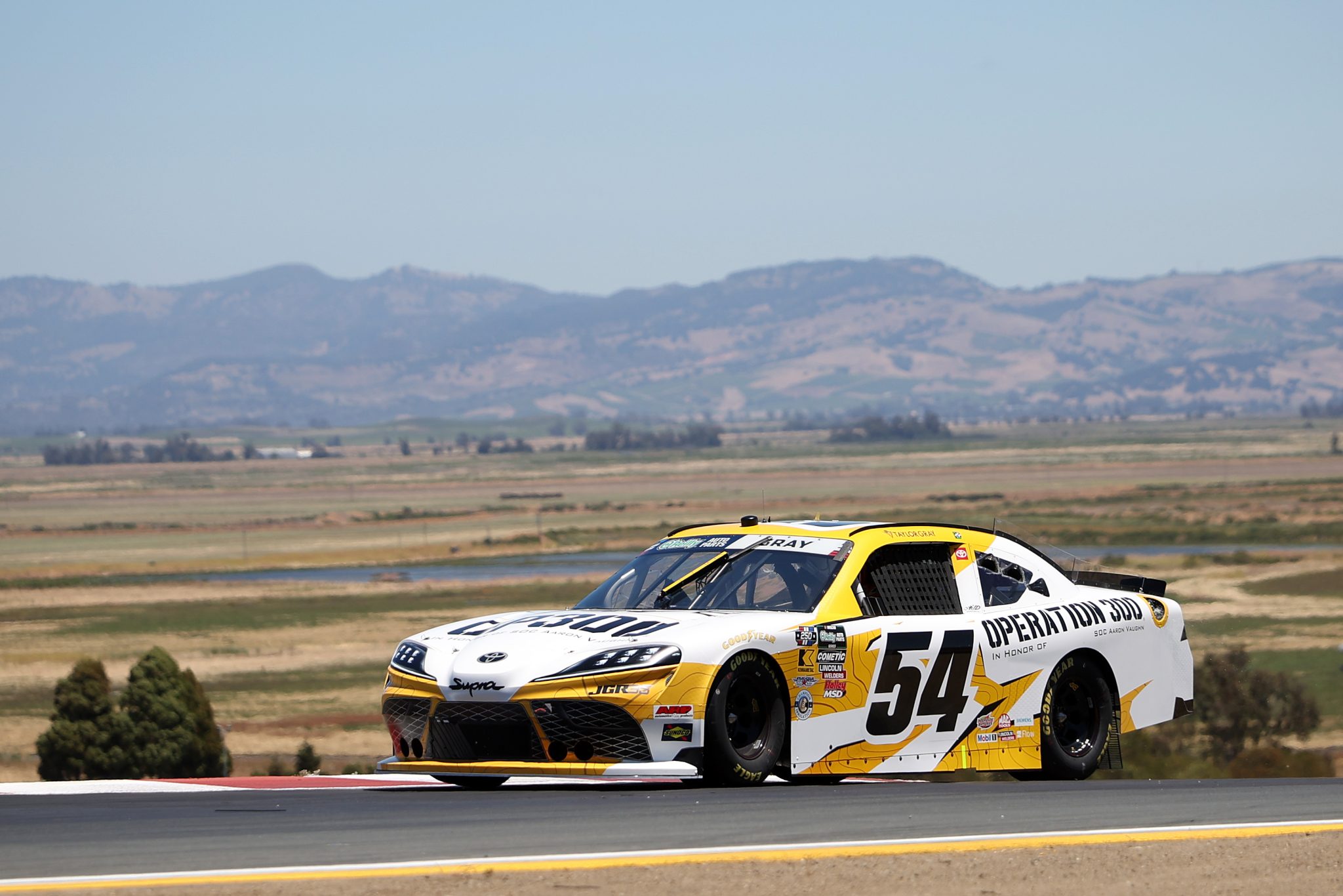 SONOMA, CALIFORNIA - JUNE 26: Taylor Gray, driver of the #54 Operation 300 Toyota, drives during practice for the NASCAR O'Reilly Auto Parts Series Pit Boss/FoodMaxx 250 at Sonoma Raceway on June 26, 2026 in Sonoma, California. (Photo by James Gilbert/Getty Images) | Getty Images