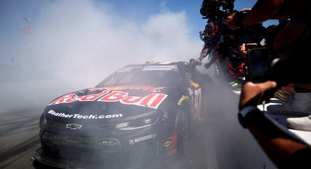 SONOMA, CALIFORNIA - JUNE 28: Shane Van Gisbergen, driver of the #97 Red Bull Chevrolet, celebrates with a burnout in front of his crew on the wall after winning the NASCAR Cup Series Toyota/Save Mart 350 at Sonoma Raceway on June 28, 2026 in Sonoma, California. (Photo by James Gilbert/Getty Images) | Getty Images