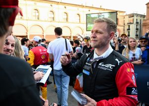 IMOLA, ITALY - APRIL 16: Kevin Magnussen of Denmark and BMW M Team WRT signs autographs for fans in Piazza Matteotti before the World Endurance Championship 6 Hours of Imola at Autodromo Enzo e Dino Ferrari on April 16, 2026 in Imola, Italy. (Photo by Sam Bagnall/Getty Images) | Getty Images