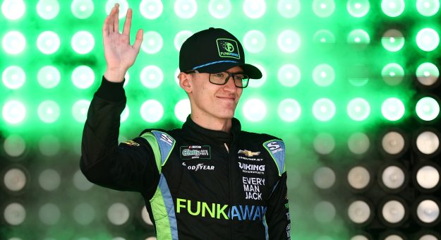 DOVER, DELAWARE - MAY 16: Parker Retzlaff, driver of the #99 FUNKAWAY Chevrolet, waves to fans as he walks onstage during driver intros prior to the NASCAR O'Reilly Auto Parts Series BetRivers 200 at Dover Motor Speedway on May 16, 2026 in Dover, Delaware. (Photo by Meg Oliphant/Getty Images) | Getty Images