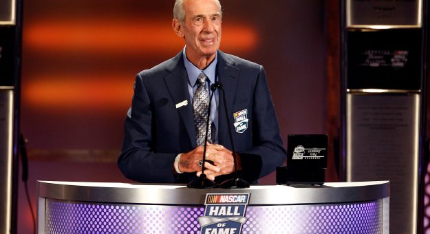 CHARLOTTE, NC - MAY 23:  Class of 2011 Inductee Ned Jarrett speaks on stage during the 2011 NASCAR Hall of Fame induction ceremonies at the Charlotte Convention Center on May 23, 2011 in Charlotte, North Carolina.  (Photo by John Harrelson/Getty Images for NASCAR) | Getty Images