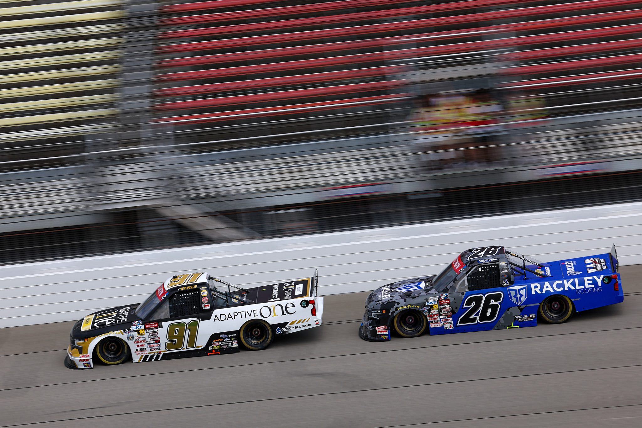 BROOKLYN, MICHIGAN - JUNE 06: Christian Eckes, driver of the #91 Adaptive One Calipers Chevrolet, and Dawson Sutton, driver of the #26 Rackley Roofing Chevrolet, drive during practice for the NASCAR Craftsman Truck Series DQS Solutions & Staffing 250 presented by Precision Vehicle Logistics at Michigan International Speedway on June 06, 2026 in Brooklyn, Michigan. (Photo by Brett Farmer/Getty Images) | Getty Images