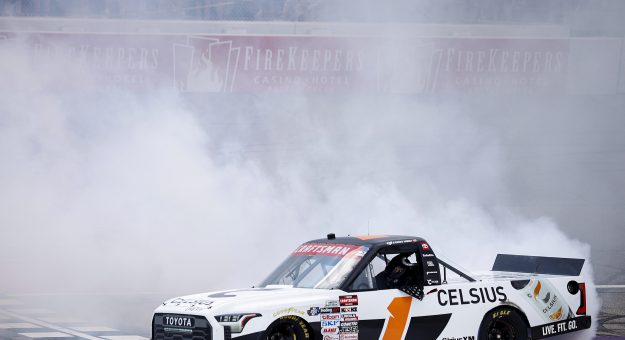 BROOKLYN, MICHIGAN - JUNE 06: Corey Heim, driver of the #1 Celsius Toyota, celebrates with a burnout after winning the NASCAR Craftsman Truck Series DQS Solutions & Staffing 250 presented by Precision Vehicle Logistics at Michigan International Speedway on June 06, 2026 in Brooklyn, Michigan. (Photo by Sean Gardner/Getty Images) | Getty Images