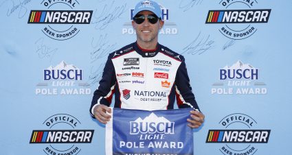 BROOKLYN, MICHIGAN - JUNE 06: Denny Hamlin, driver of the #11 National Debt Relief Toyota, poses for photos after winning the pole award during qualifying for the NASCAR Cup Series FireKeepers Casino 400 at Michigan International Speedway on June 06, 2026 in Brooklyn, Michigan. (Photo by Sean Gardner/Getty Images) | Getty Images