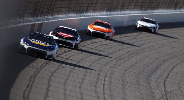 BROOKLYN, MICHIGAN - JUNE 07: Chase Elliott, driver of the #9 NAPA Auto Parts Chevrolet, and Christopher Bell, driver of the #20 Rheem Toyota, race during the NASCAR Cup Series FireKeepers Casino 400 at Michigan International Speedway on June 07, 2026 in Brooklyn, Michigan. (Photo by Brett Farmer/Getty Images) | Getty Images