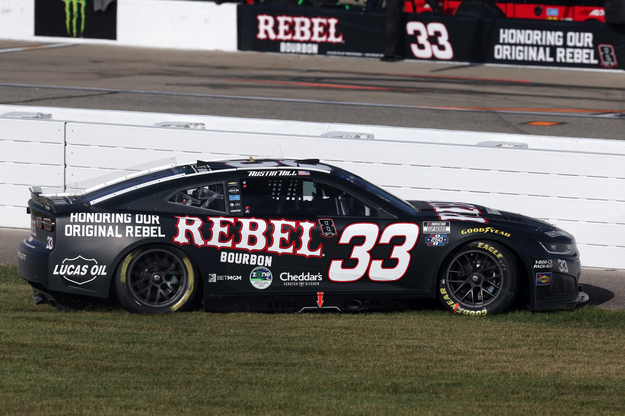 BROOKLYN, MICHIGAN - JUNE 07: Austin Hill, driver of the #33 Rebel Bourbon Chevrolet, spins into the grass after an on-track incident during the NASCAR Cup Series FireKeepers Casino 400 at Michigan International Speedway on June 07, 2026 in Brooklyn, Michigan. (Photo by Brett Farmer/Getty Images) | Getty Images