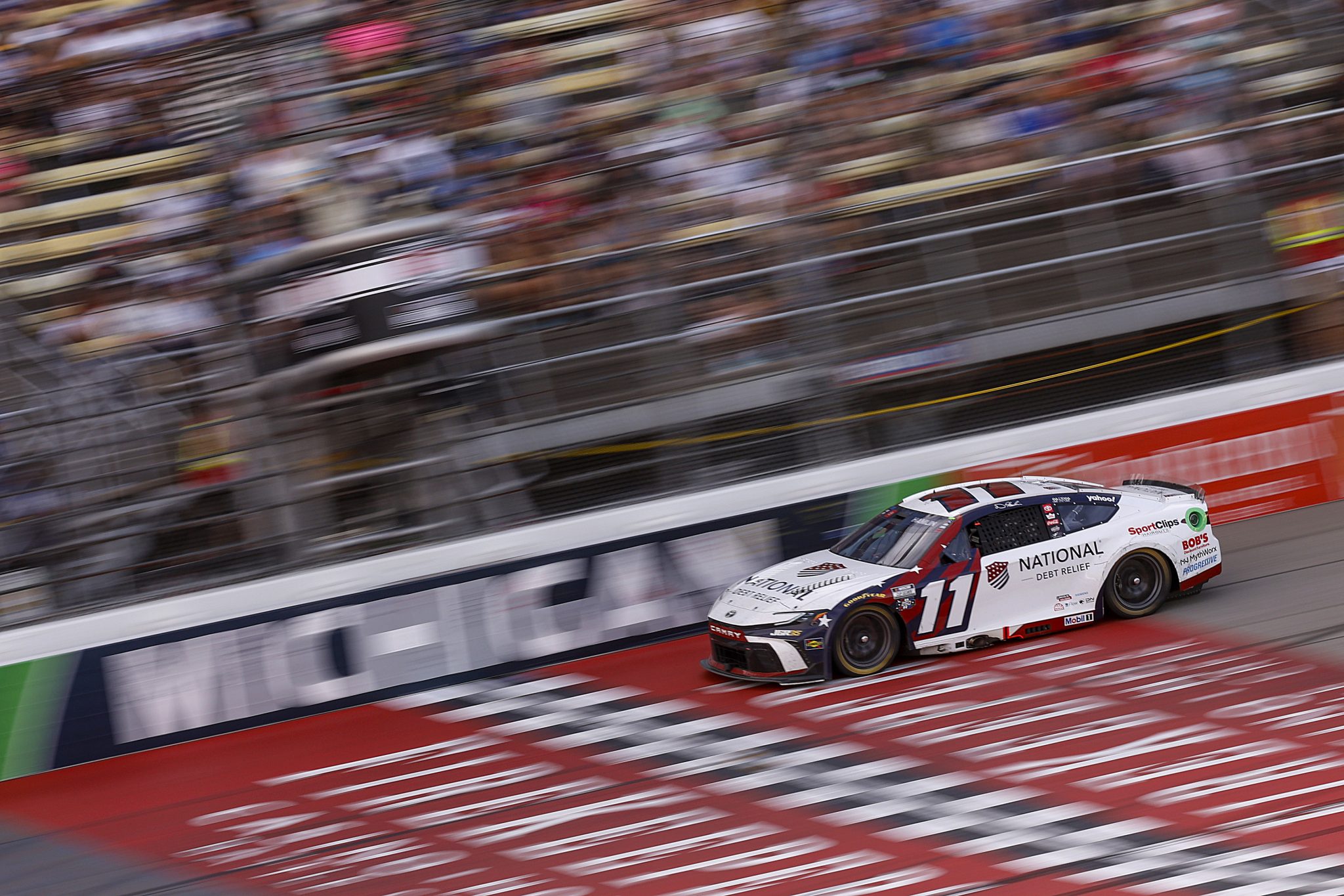 BROOKLYN, MICHIGAN - JUNE 07: Denny Hamlin, driver of the #11 National Debt Relief Toyota, drives during the NASCAR Cup Series FireKeepers Casino 400 at Michigan International Speedway on June 07, 2026 in Brooklyn, Michigan. (Photo by Sean Gardner/Getty Images) | Getty Images