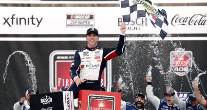 BROOKLYN, MICHIGAN - JUNE 07: Denny Hamlin, driver of the #11 National Debt Relief Toyota, celebrates in victory lane after winning the NASCAR Cup Series FireKeepers Casino 400 at Michigan International Speedway on June 07, 2026 in Brooklyn, Michigan. (Photo by Sean Gardner/Getty Images) | Getty Images