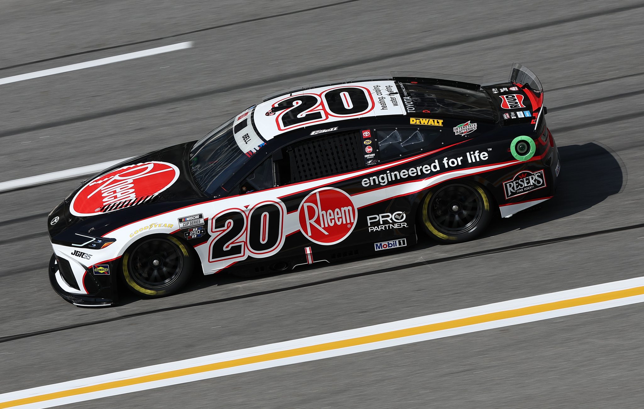 HAMPTON, GEORGIA - JULY 11: Christopher Bell, driver of the #20 Rheem Toyota, drives during qualifying for the NASCAR Cup Series Quaker State 400 Available at Walmart at EchoPark Speedway on July 11, 2026 in Hampton, Georgia. (Photo by Meg Oliphant/Getty Images) | Getty Images
