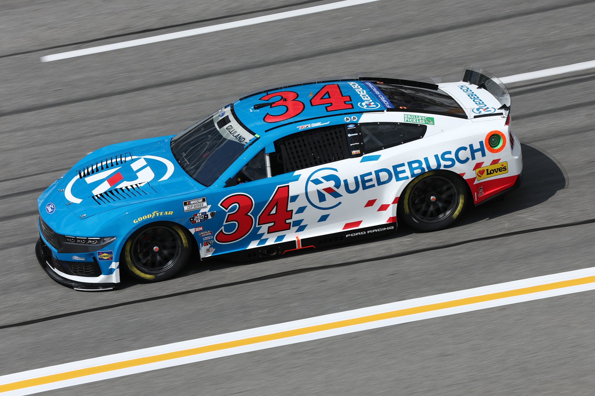 HAMPTON, GEORGIA - JULY 11: Todd Gilliland, driver of the #34 "Ruedebusch Development & Construction, , drives during qualifying for the NASCAR Cup Series Quaker State 400 Available at Walmart at EchoPark Speedway on July 11, 2026 in Hampton, Georgia. (Photo by Meg Oliphant/Getty Images) | Getty Images