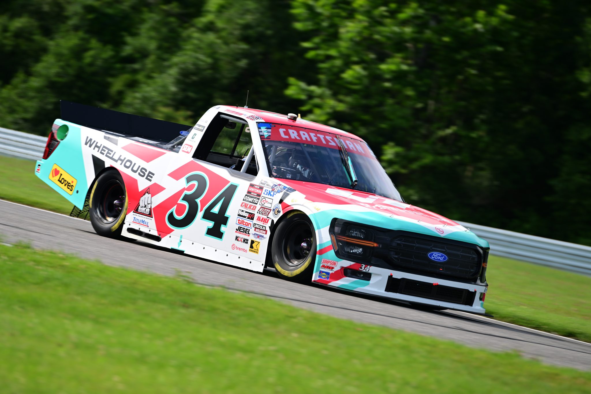 LAKEVILLE, CONNECTICUT - JULY 11: Layne Riggs, driver of the #34 Wheelhouse Racing School Ford, drives during practice for the NASCAR Craftsman Truck Series LiUNA 150 at Lime Rock Park on July 11, 2026 in Lakeville, Connecticut. (Photo by Jaiden Tripi/Getty Images) | Getty Images