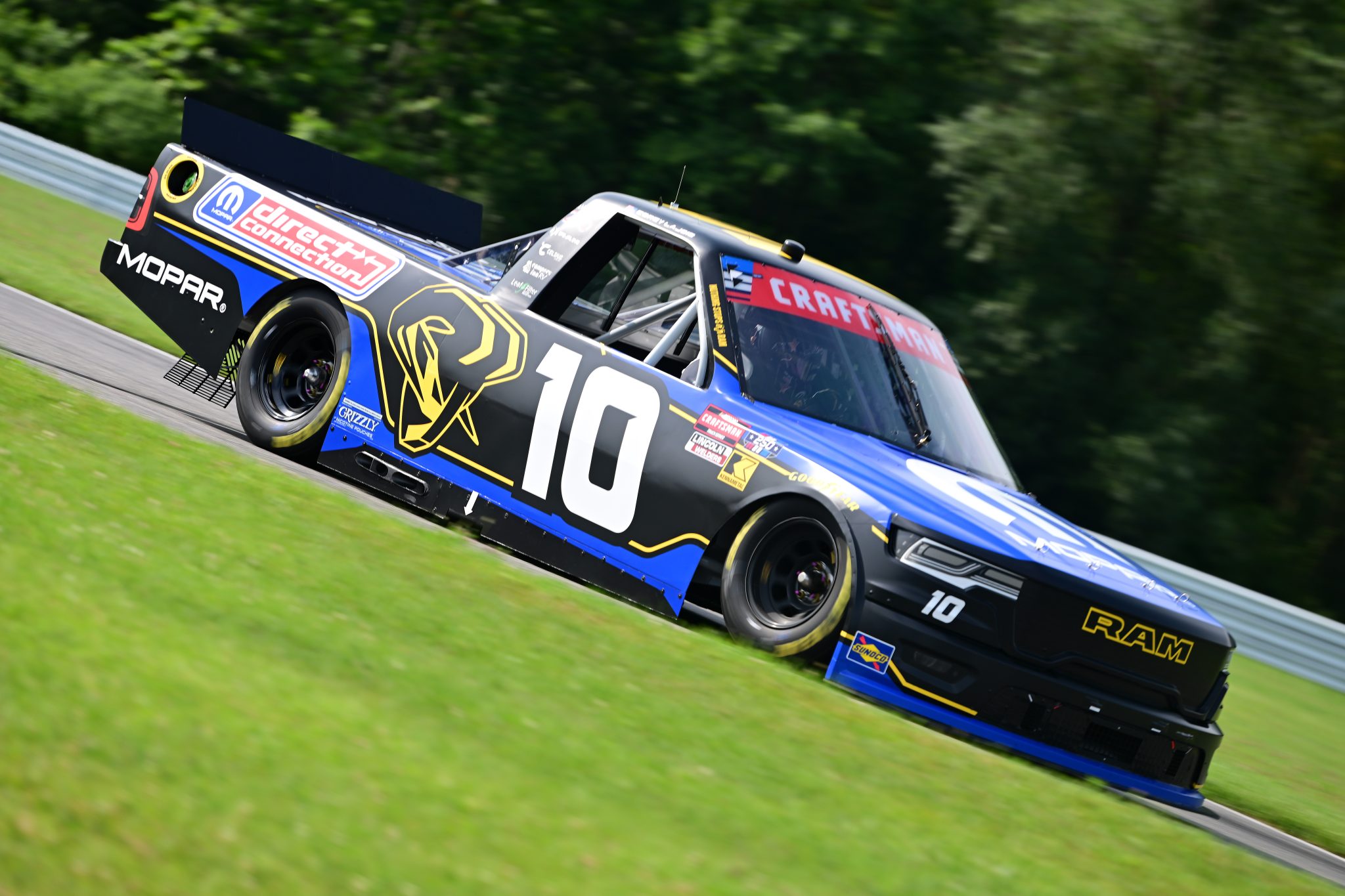 LAKEVILLE, CONNECTICUT - JULY 11: Corey LaJoie, driver of the #10 Mopar RAM, drives during practice for the NASCAR Craftsman Truck Series LiUNA 150 at Lime Rock Park on July 11, 2026 in Lakeville, Connecticut. (Photo by Jaiden Tripi/Getty Images) | Getty Images