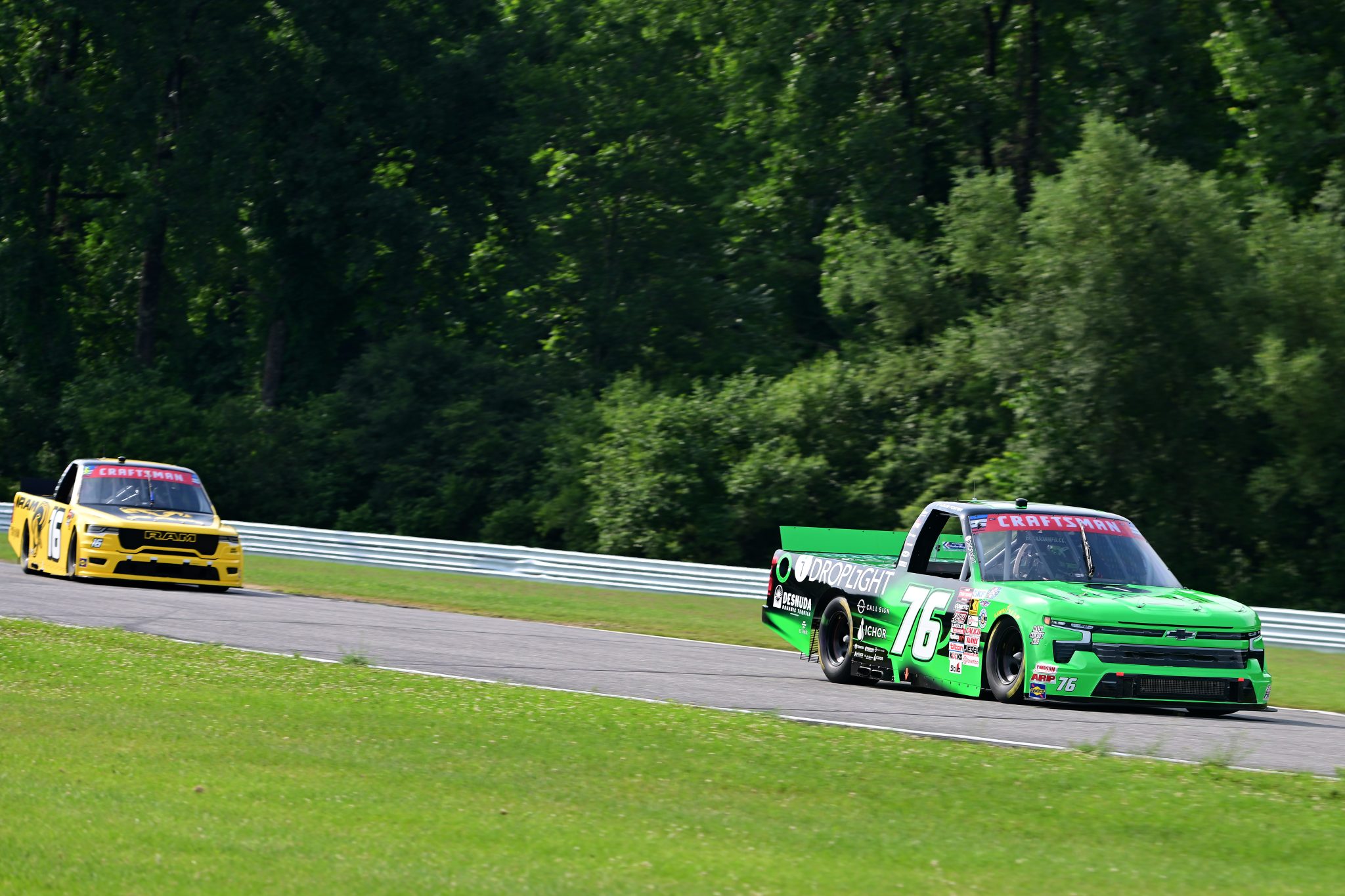LAKEVILLE, CONNECTICUT - JULY 11: Louis Foster, driver of the #76 DROPLIGHT Chevrolet, and Justin Haley, driver of the #16 RAM RAM, drive during practice for the NASCAR Craftsman Truck Series LiUNA 150 at Lime Rock Park on July 11, 2026 in Lakeville, Connecticut. (Photo by Jaiden Tripi/Getty Images) | Getty Images
