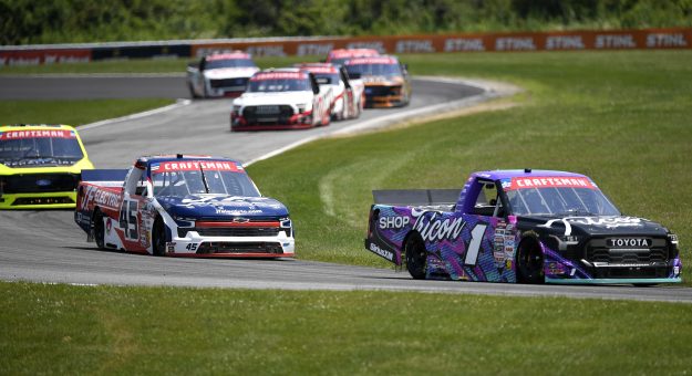 LAKEVILLE, CONNECTICUT - JULY 11: Thomas Annunziata, driver of the #1 ShopTRICON.com Toyota, and Landen Lewis, driver of the #45 J.F. Electric/Utilitra Chevrolet, race during the NASCAR Craftsman Truck Series LiUNA 150 at Lime Rock Park on July 11, 2026 in Lakeville, Connecticut. (Photo by Jaiden Tripi/Getty Images) | Getty Images