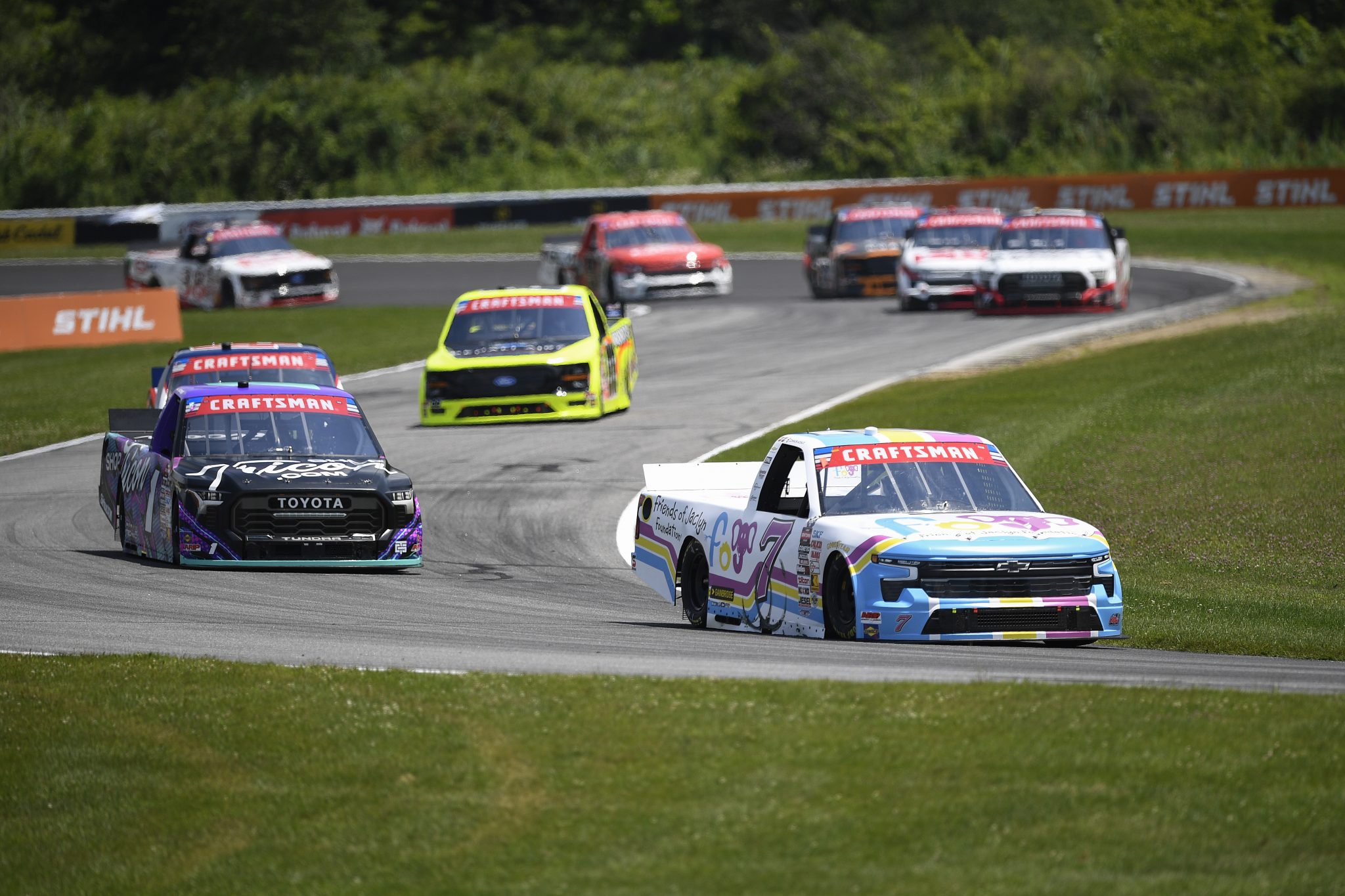 LAKEVILLE, CONNECTICUT - JULY 11: Connor Mosack, driver of the #7 Friends of Jaclyn Foundation Chevrolet, and Thomas Annunziata, driver of the #1 ShopTRICON.com Toyota, race during the NASCAR Craftsman Truck Series LiUNA 150 at Lime Rock Park on July 11, 2026 in Lakeville, Connecticut. (Photo by Jaiden Tripi/Getty Images) | Getty Images