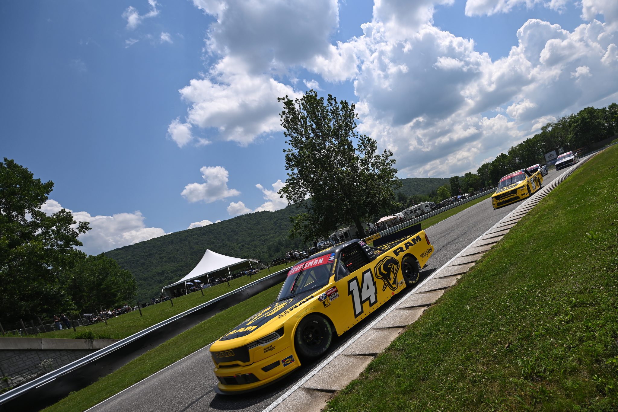 LAKEVILLE, CONNECTICUT - JULY 11: Mini Tyrrell, driver of the #14 RAM RAM, and Justin Haley, driver of the #16 RAM RAM, race during the NASCAR Craftsman Truck Series LiUNA 150 at Lime Rock Park on July 11, 2026 in Lakeville, Connecticut. (Photo by Jaiden Tripi/Getty Images) | Getty Images