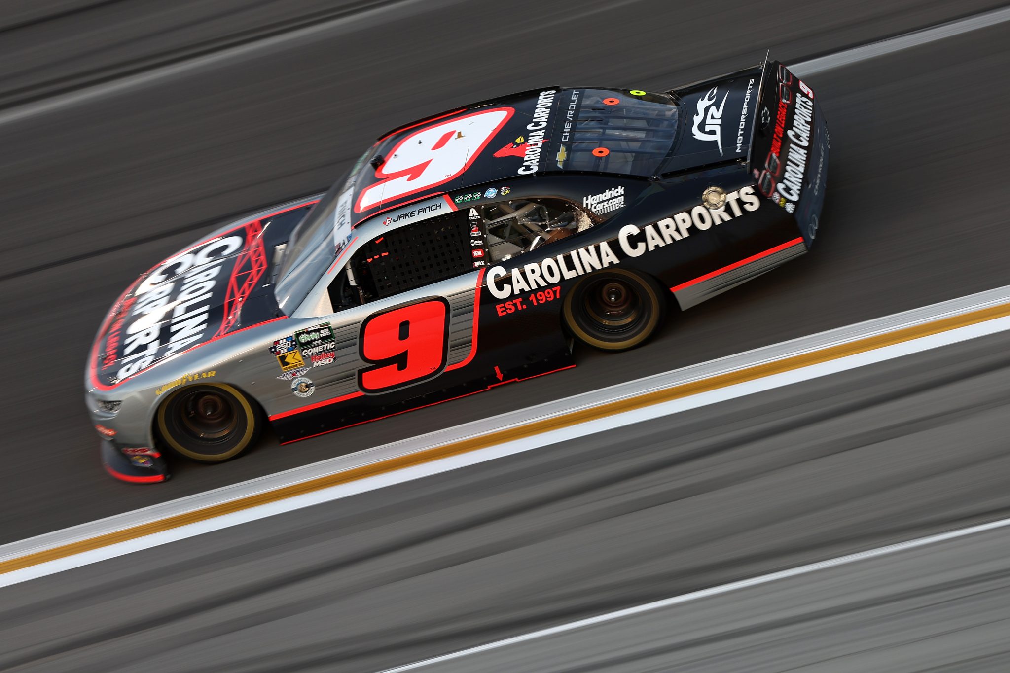 HAMPTON, GEORGIA - JULY 11: Jake Finch, driver of the #9 Carolina Carports Chevrolet, drives during the NASCAR O'Reilly Auto Parts Series Focused Health 250 at EchoPark Speedway on July 11, 2026 in Hampton, Georgia. (Photo by Meg Oliphant/Getty Images) | Getty Images