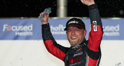 HAMPTON, GEORGIA - JULY 11: Justin Allgaier, driver of the #7 Jarrett Logistics Chevrolet, celebrates in victory lane after winning the NASCAR O'Reilly Auto Parts Series Focused Health 250 at EchoPark Speedway on July 11, 2026 in Hampton, Georgia. (Photo by Meg Oliphant/Getty Images) | Getty Images