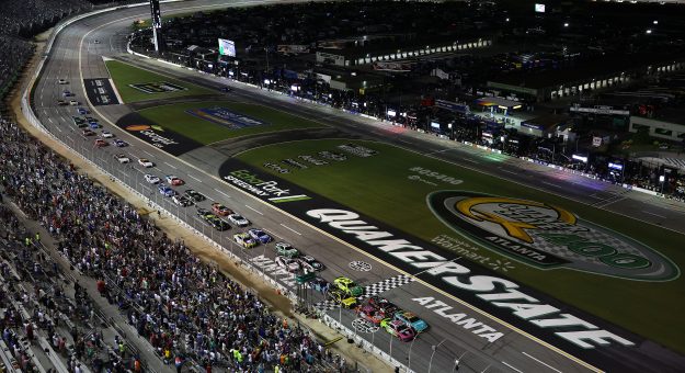 HAMPTON, GEORGIA - JULY 12: A general view of racing during the NASCAR Cup Series Quaker State 400 Available at Walmart at EchoPark Speedway on July 12, 2026 in Hampton, Georgia. (Photo by Meg Oliphant/Getty Images) | Getty Images