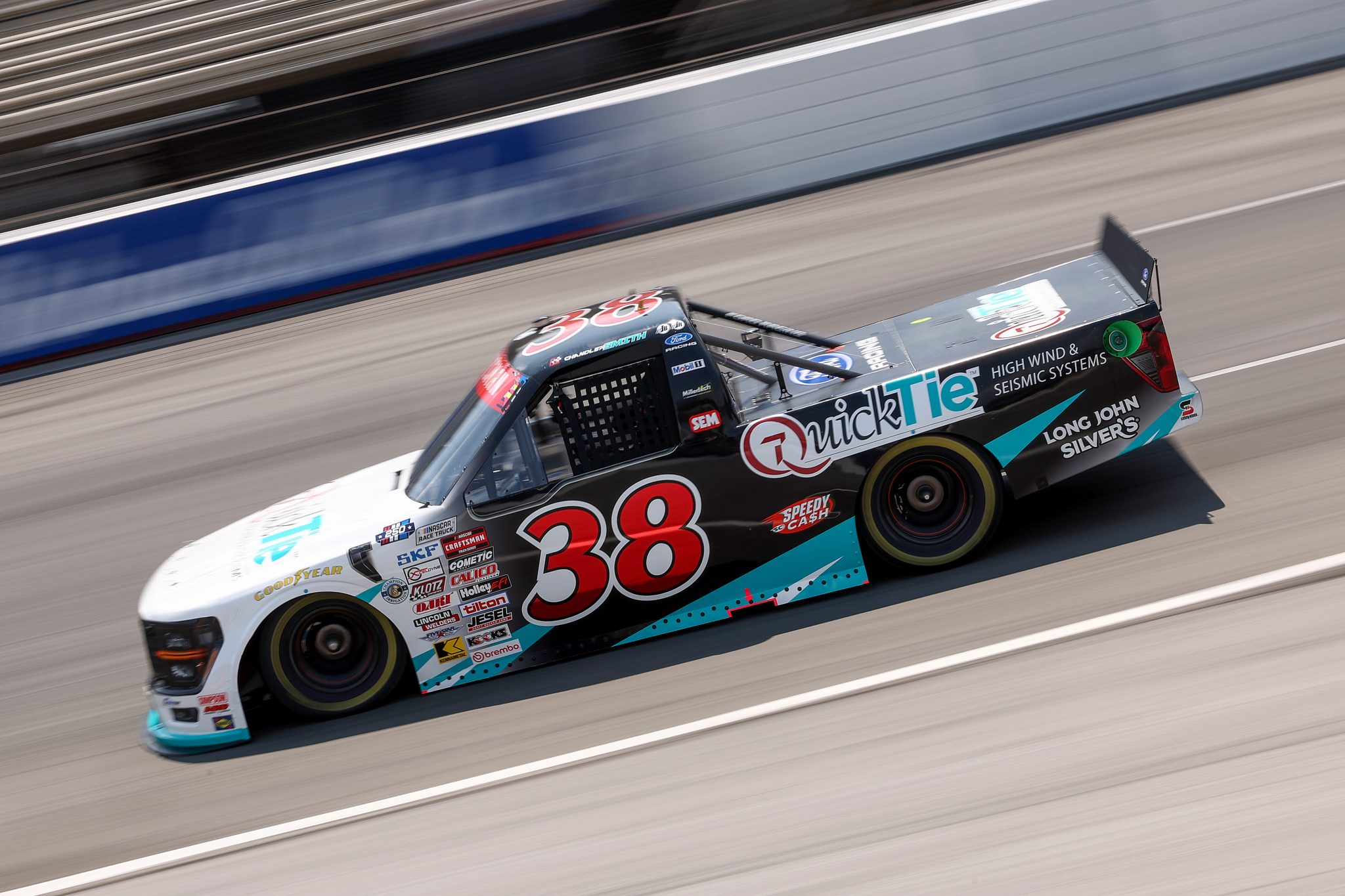 NORTH WILKESBORO, NORTH CAROLINA - JULY 17: Chandler Smith, driver of the #38 QuickTie Ford, drives during practice for the NASCAR Craftsman Truck Series Faith Fest 250 at North Wilkesboro Speedway on July 17, 2026 in North Wilkesboro, North Carolina. (Photo by Meg Oliphant/Getty Images) | Getty Images