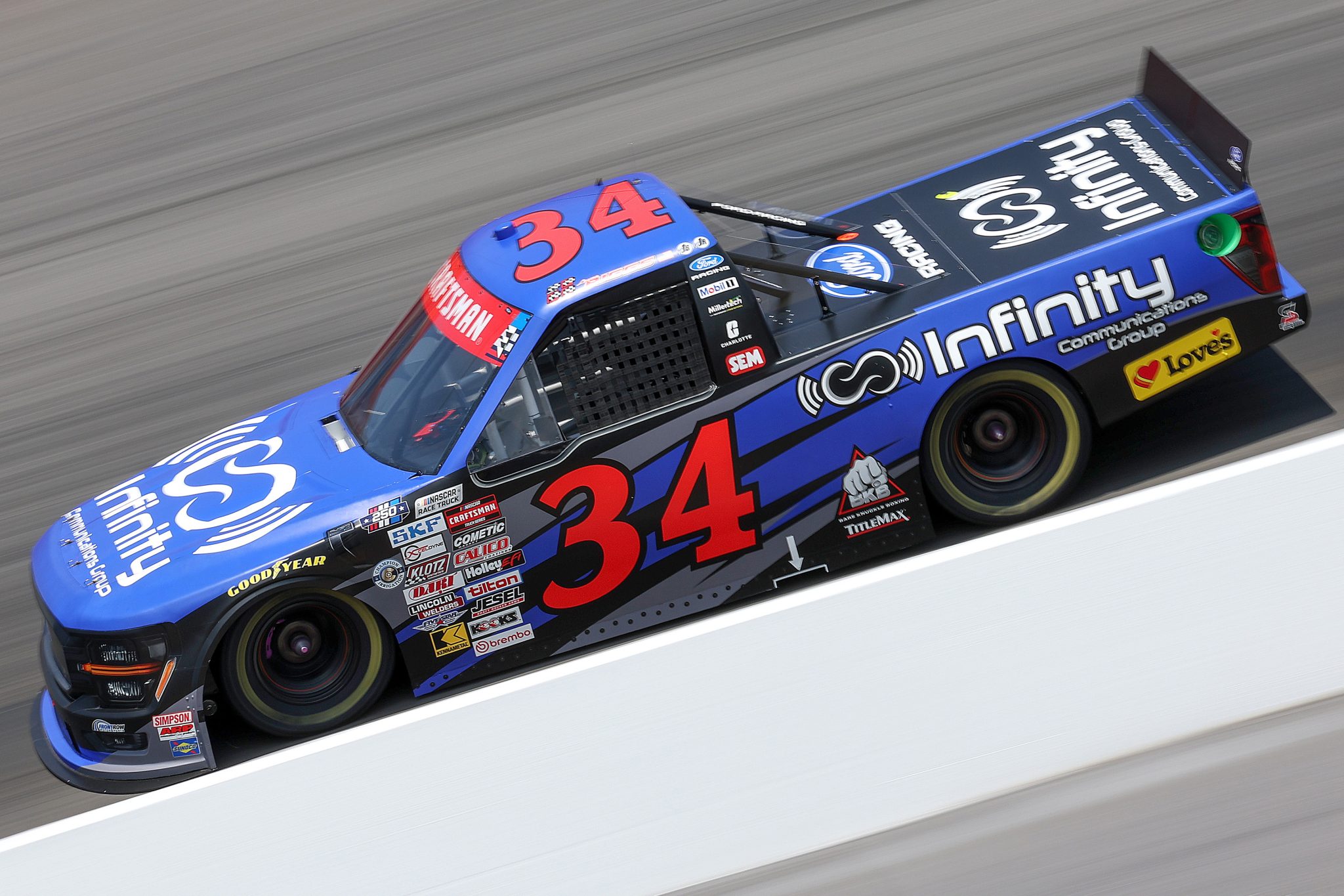 NORTH WILKESBORO, NORTH CAROLINA - JULY 17: Layne Riggs, driver of the #34 Infinity Communications Group Ford, drives during practice for the NASCAR Craftsman Truck Series Faith Fest 250 at North Wilkesboro Speedway on July 17, 2026 in North Wilkesboro, North Carolina. (Photo by David Jensen/Getty Images) | Getty Images