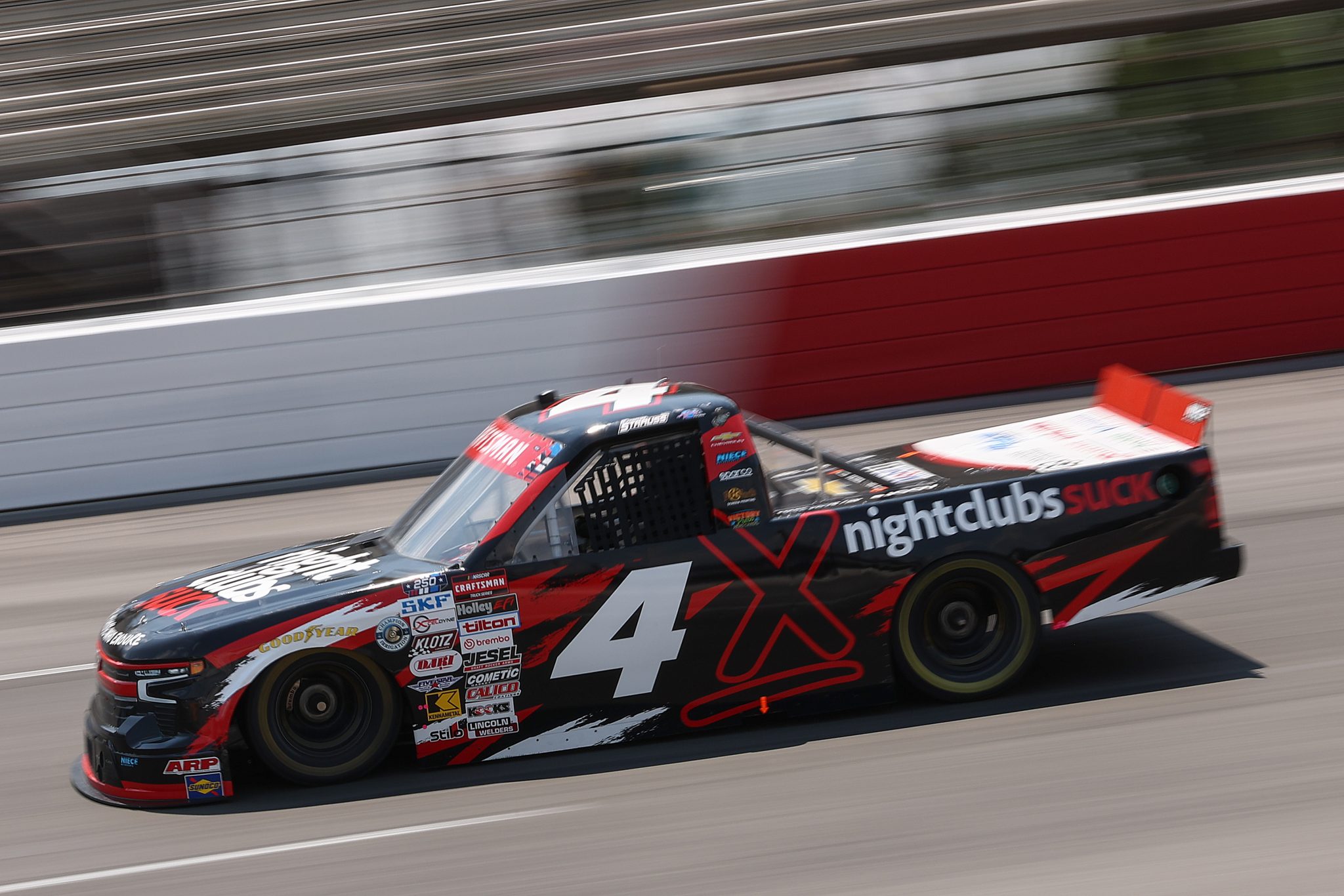 NORTH WILKESBORO, NORTH CAROLINA - JULY 17: Donovan Strauss, driver of the #4 Nightclubs Suck Chevrolet, drives during practice for the NASCAR Craftsman Truck Series Faith Fest 250 at North Wilkesboro Speedway on July 17, 2026 in North Wilkesboro, North Carolina. (Photo by Meg Oliphant/Getty Images) | Getty Images