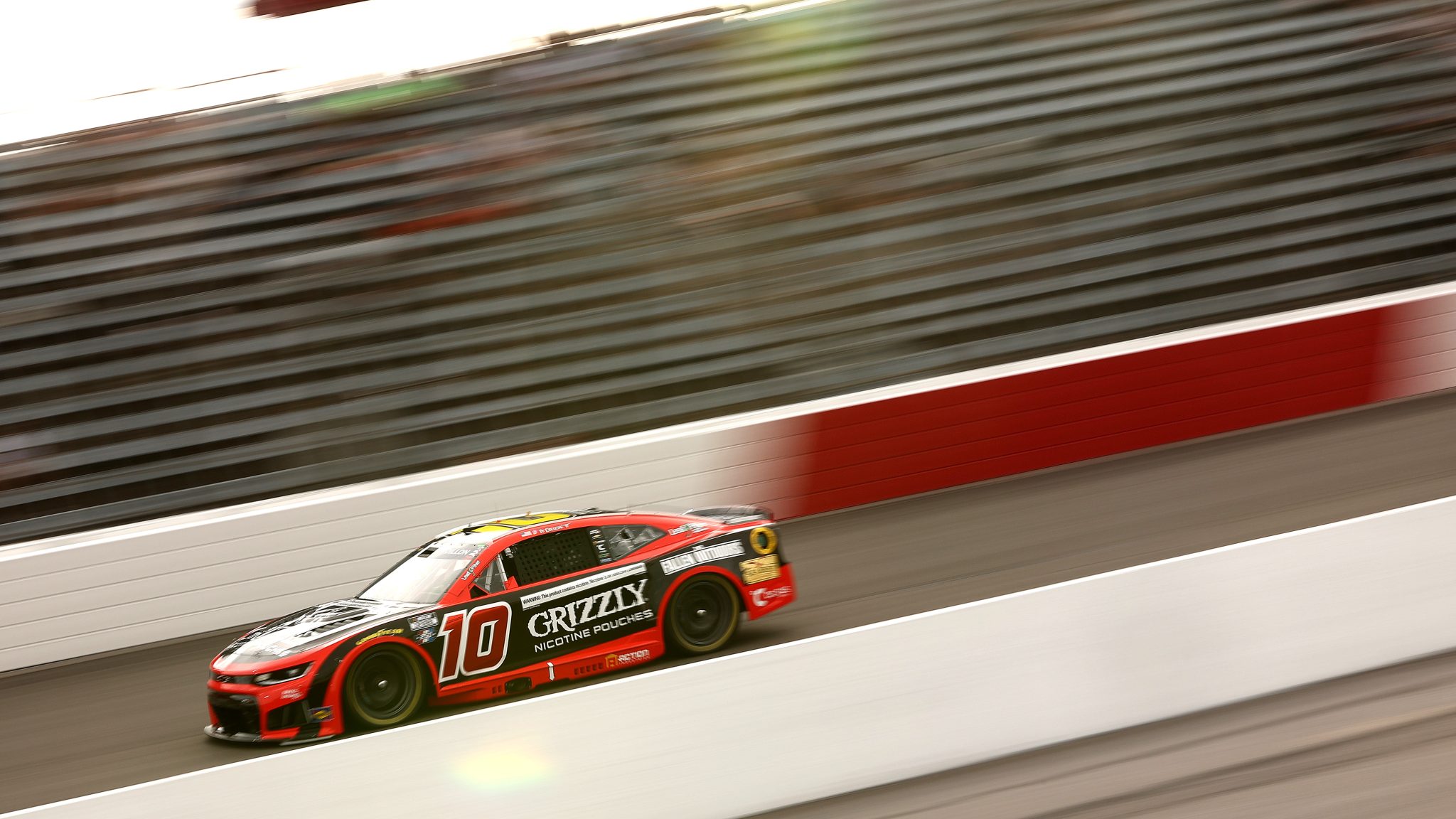 NORTH WILKESBORO, NORTH CAROLINA - JULY 18: Ty Dillon, driver of the #10 Grizzly Nicotine Pouches Chevrolet, drives during practice for the NASCAR Cup Series Window World 450 at North Wilkesboro Speedway on July 18, 2026 in North Wilkesboro, North Carolina. (Photo by Meg Oliphant/Getty Images) | Getty Images