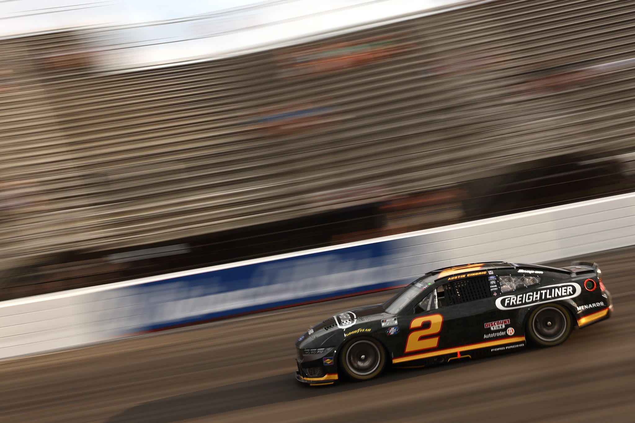 NORTH WILKESBORO, NORTH CAROLINA - JULY 18: Austin Cindric, driver of the #2 Freightliner Ford, drives during practice for the NASCAR Cup Series Window World 450 at North Wilkesboro Speedway on July 18, 2026 in North Wilkesboro, North Carolina. (Photo by Meg Oliphant/Getty Images) | Getty Images