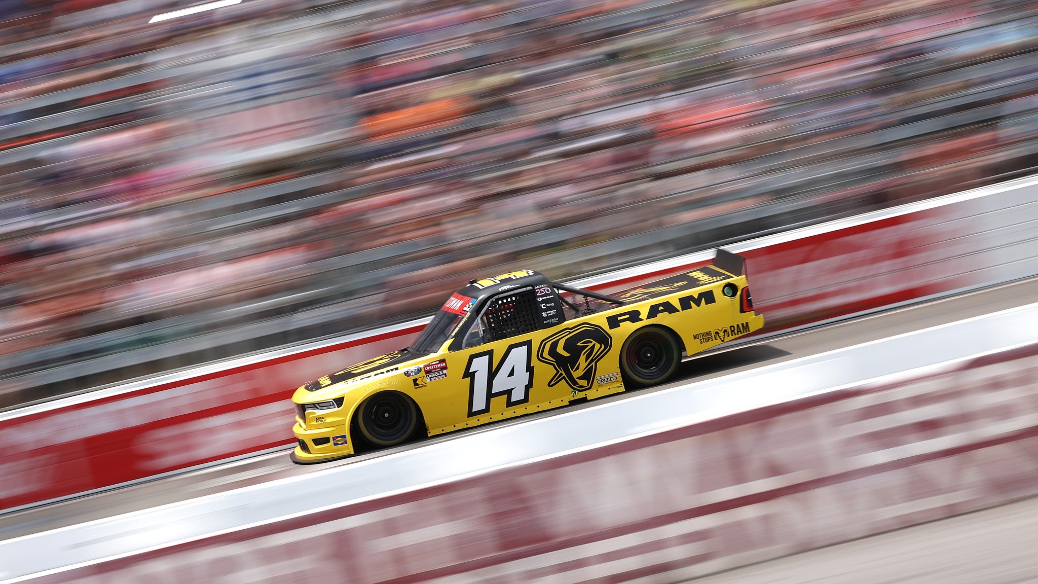 NORTH WILKESBORO, NORTH CAROLINA - JULY 18: Mini Tyrrell, driver of the #14 RAM RAM, drives during the NASCAR Craftsman Truck Series Faith Fest 250 at North Wilkesboro Speedway on July 18, 2026 in North Wilkesboro, North Carolina. (Photo by David Jensen/Getty Images) | Getty Images