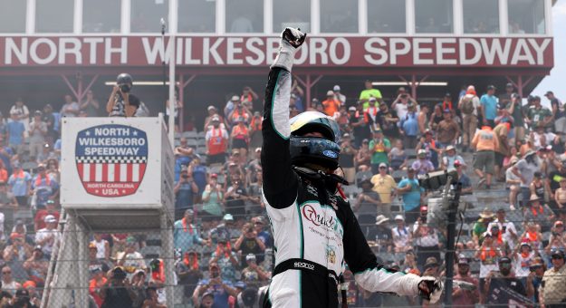 NORTH WILKESBORO, NORTH CAROLINA - JULY 18: Chandler Smith, driver of the #38 QuickTie Ford, celebrates after winning the NASCAR Craftsman Truck Series Faith Fest 250 at North Wilkesboro Speedway on July 18, 2026 in North Wilkesboro, North Carolina. (Photo by David Jensen/Getty Images) | Getty Images