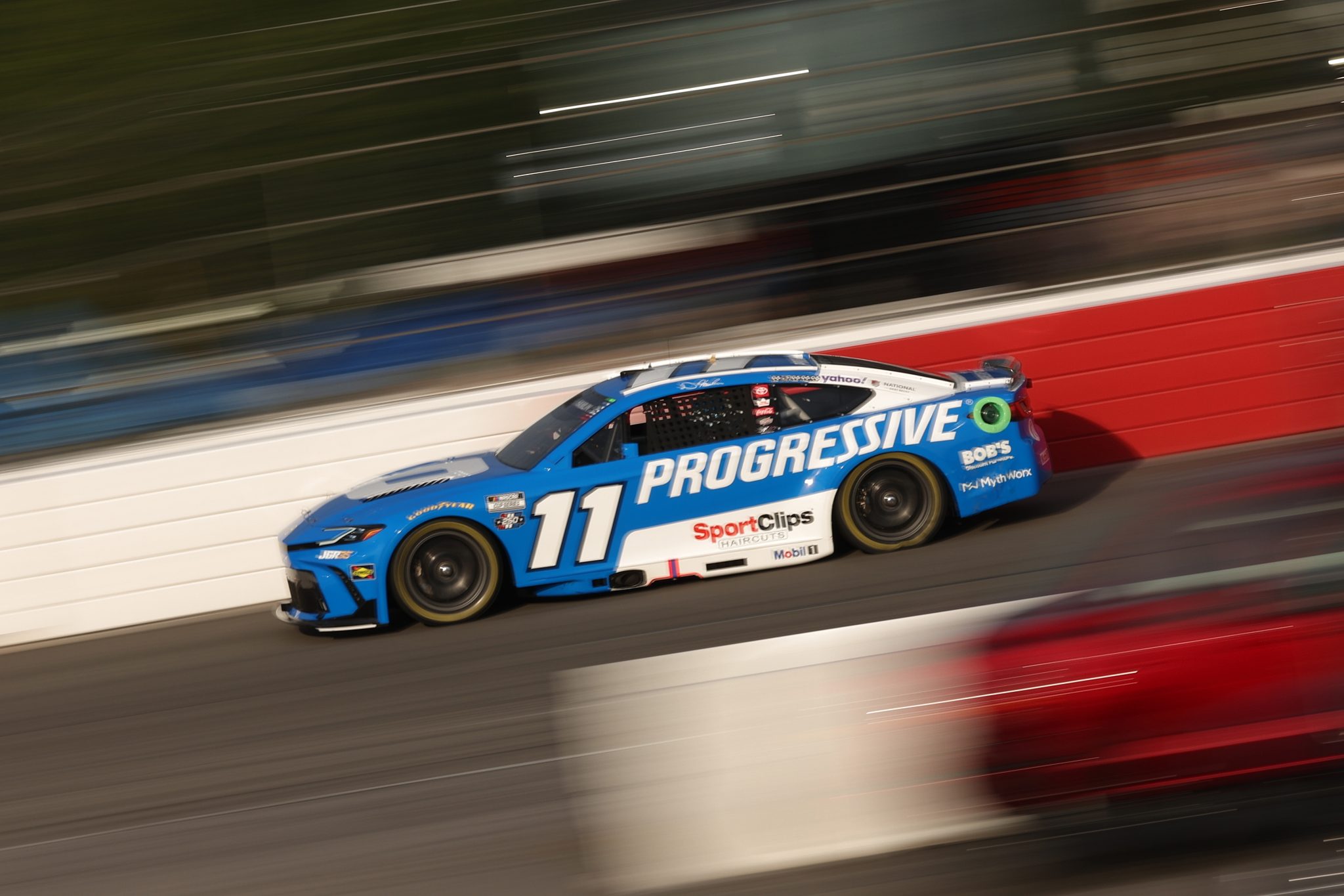 NORTH WILKESBORO, NORTH CAROLINA - JULY 18: Denny Hamlin, driver of the #11 Progressive Insurance Toyota, drives during practice for the NASCAR Cup Series Window World 450 at North Wilkesboro Speedway on July 18, 2026 in North Wilkesboro, North Carolina. (Photo by David Jensen/Getty Images) | Getty Images