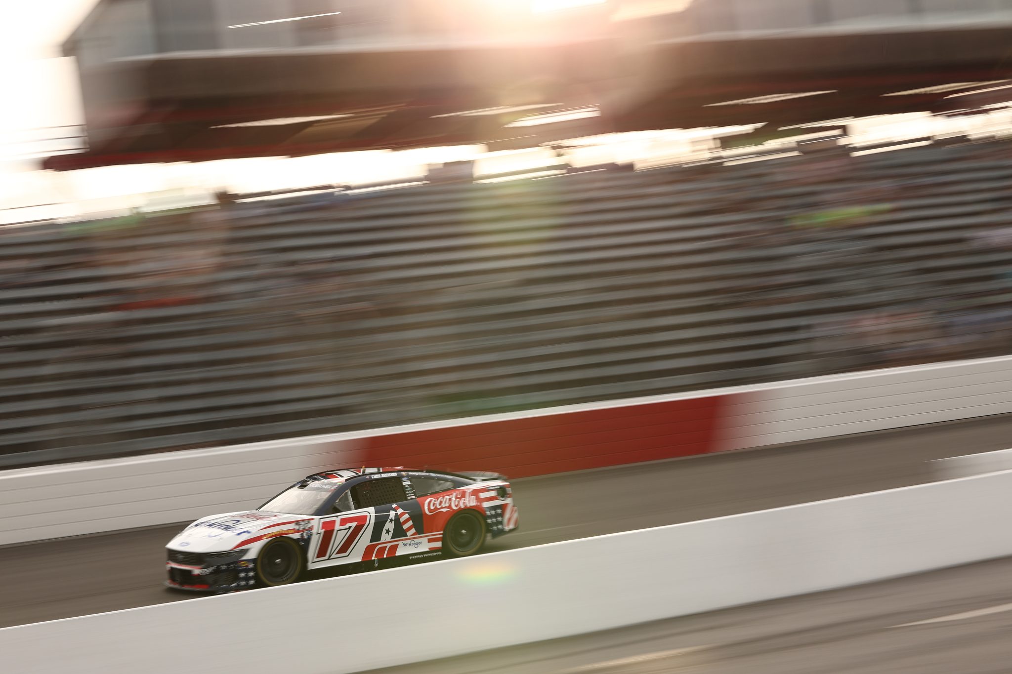 NORTH WILKESBORO, NORTH CAROLINA - JULY 18: Chris Buescher, driver of the #17 Kroger/Coca-Cola Ford, drives during practice for the NASCAR Cup Series Window World 450 at North Wilkesboro Speedway on July 18, 2026 in North Wilkesboro, North Carolina. (Photo by Meg Oliphant/Getty Images) | Getty Images
