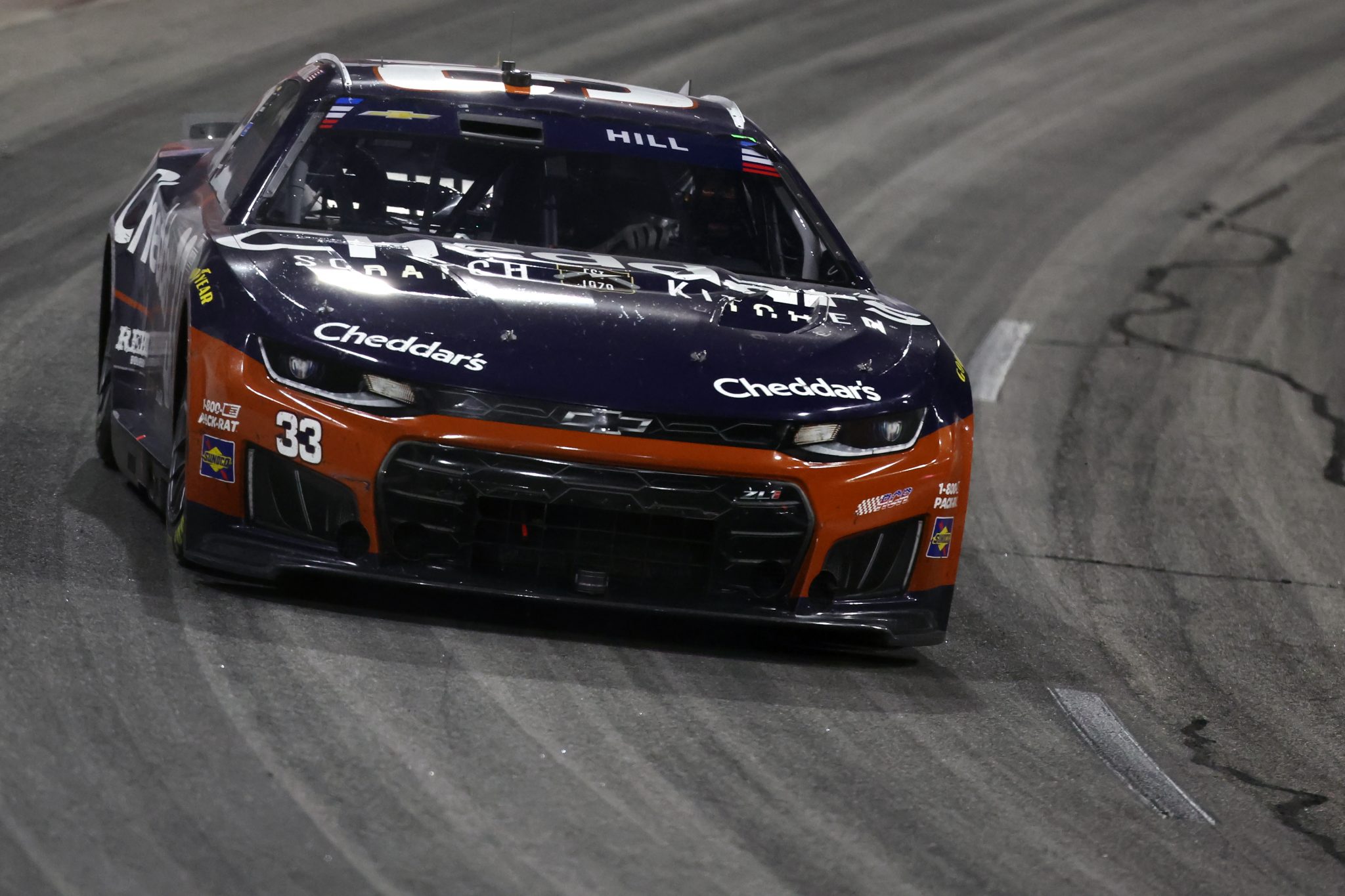 NORTH WILKESBORO, NORTH CAROLINA - JULY 19: Austin Hill, driver of the #33 Cheddar's Scratch Kitchen Chevrolet, races during the NASCAR Cup Series Window World 450 at North Wilkesboro Speedway on July 19, 2026 in North Wilkesboro, North Carolina. (Photo by David Jensen/Getty Images) | Getty Images