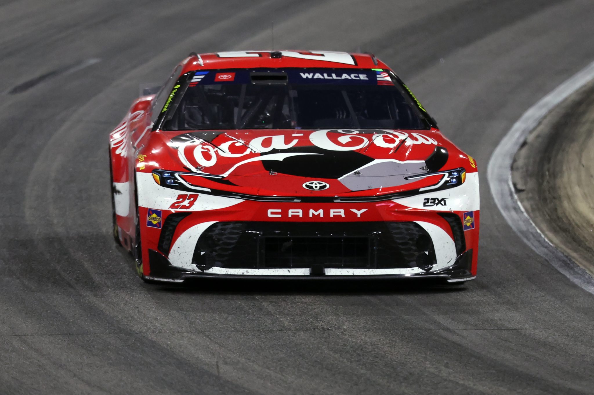 NORTH WILKESBORO, NORTH CAROLINA - JULY 19: Bubba Wallace, driver of the #23 Coca-Cola Toyota, races during the NASCAR Cup Series Window World 450 at North Wilkesboro Speedway on July 19, 2026 in North Wilkesboro, North Carolina. (Photo by David Jensen/Getty Images) | Getty Images