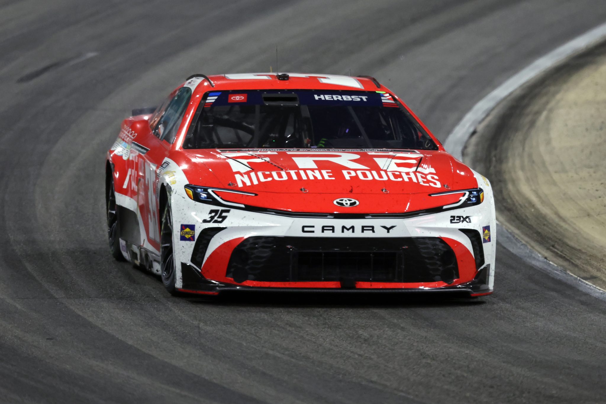 NORTH WILKESBORO, NORTH CAROLINA - JULY 19: Riley Herbst, driver of the #35 FRE Nicotine Pouches Toyota, races during the NASCAR Cup Series Window World 450 at North Wilkesboro Speedway on July 19, 2026 in North Wilkesboro, North Carolina. (Photo by David Jensen/Getty Images) | Getty Images