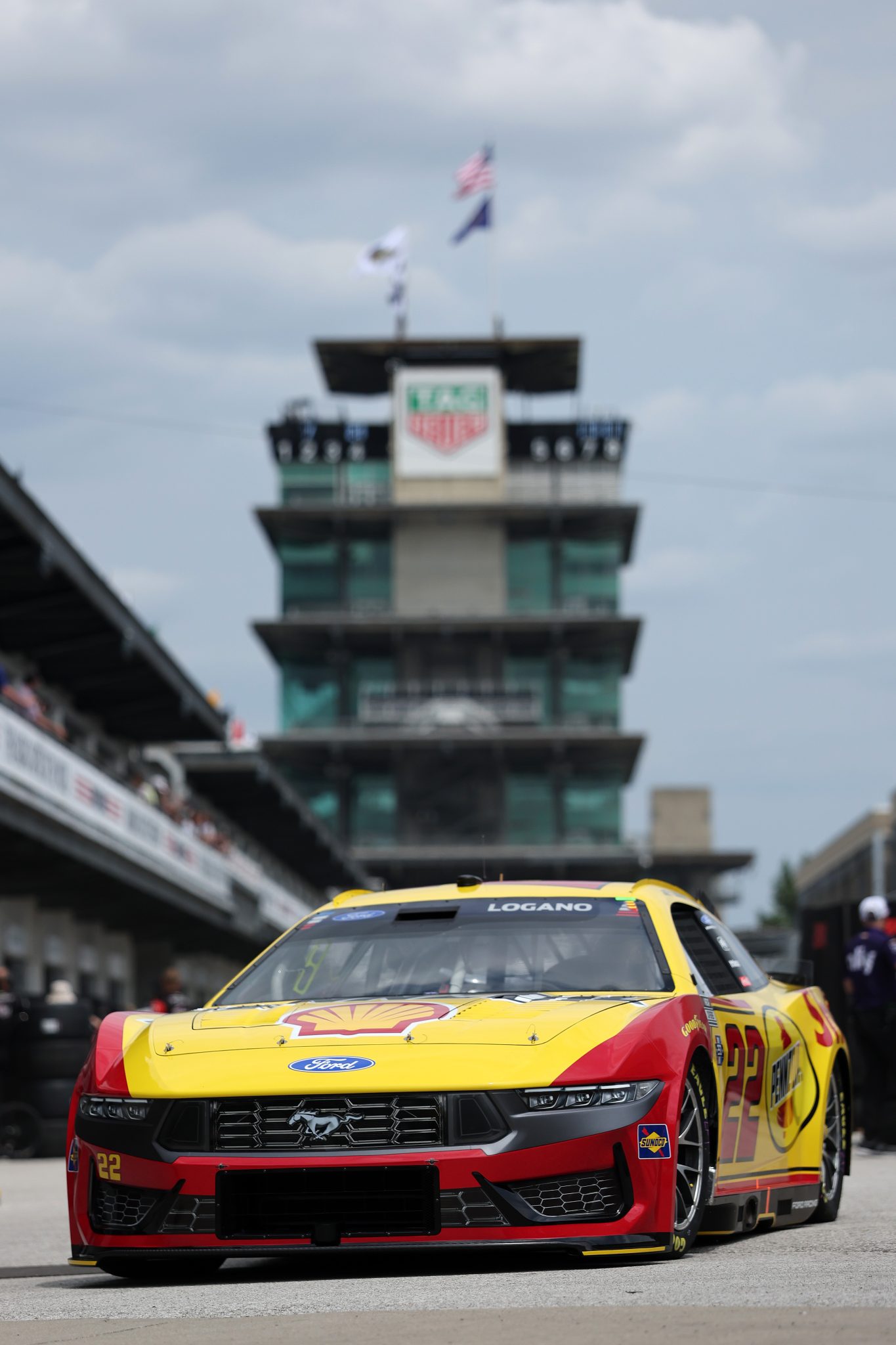 INDIANAPOLIS, INDIANA - JULY 24: Joey Logano, driver of the #22 Shell Pennzoil Ford, drives through the garage area during practice for the NASCAR Cup Series Brickyard 400 at Indianapolis Motor Speedway on July 24, 2026 in Indianapolis, Indiana. (Photo by Logan Riely/Getty Images)
