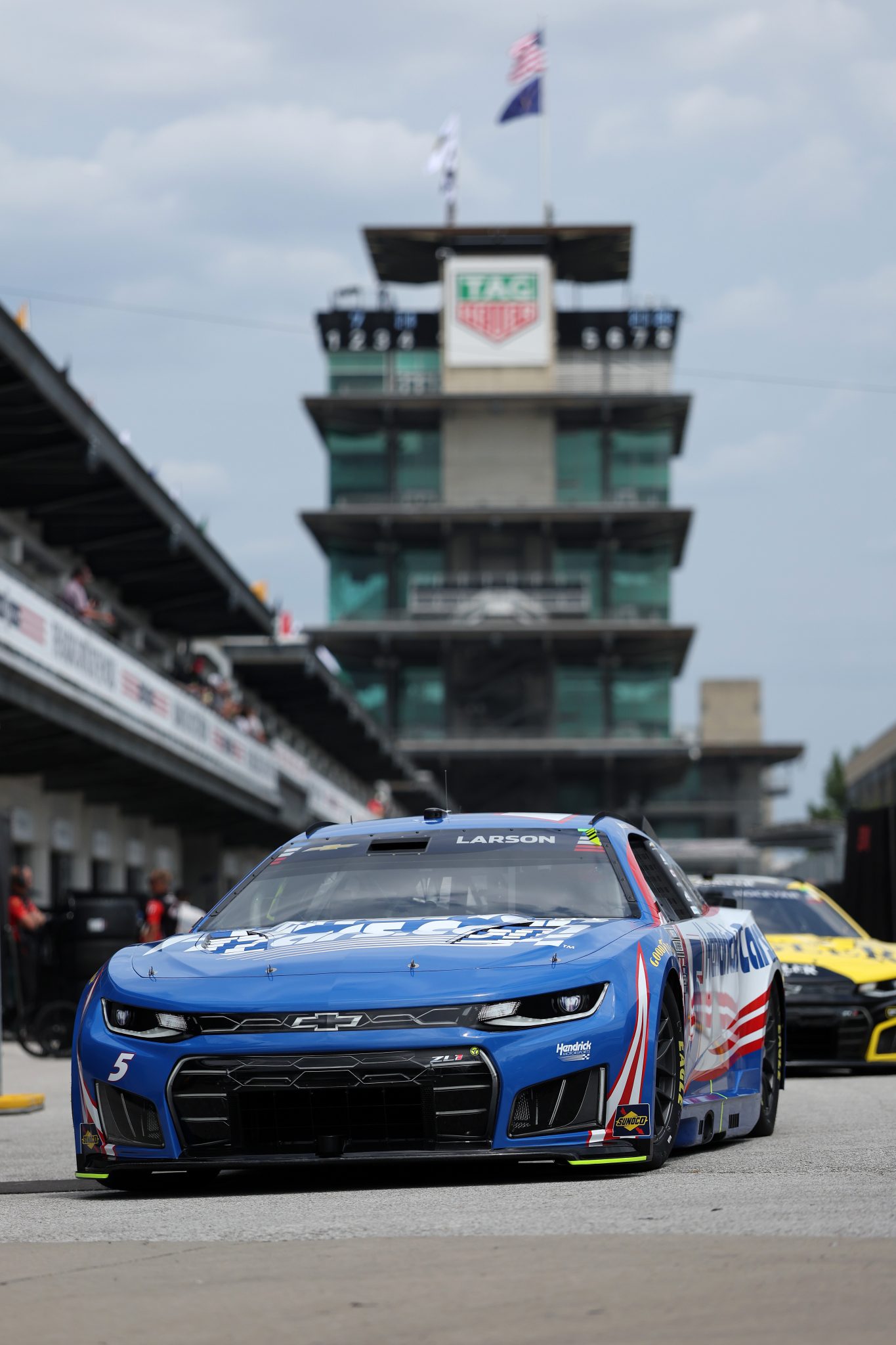 INDIANAPOLIS, INDIANA - JULY 24: Kyle Larson, driver of the #5 HendrickCars.com Chevrolet, drives through the garage area drives the garage area during practice for the NASCAR Cup Series Brickyard 400 at Indianapolis Motor Speedway on July 24, 2026 in Indianapolis, Indiana. (Photo by Logan Riely/Getty Images)