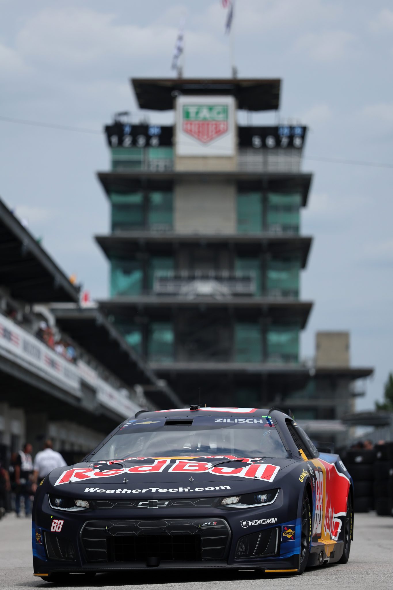 INDIANAPOLIS, INDIANA - JULY 24: Connor Zilisch, driver of the #88 Red Bull Chevrolet, drives through the garage area during practice for the NASCAR Cup Series Brickyard 400 at Indianapolis Motor Speedway on July 24, 2026 in Indianapolis, Indiana. (Photo by Logan Riely/Getty Images)