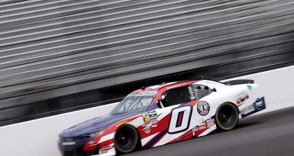 INDIANAPOLIS, INDIANA - JULY 24: Garrett Smithley, driver of the #0 SS GreenLight Racing Chevrolet, drives during practice for the NASCAR O'Reilly Auto Parts Series Pennzoil 250 Presented by Take 5 Oil Change at Indianapolis Motor Speedway on July 24, 2026 in Indianapolis, Indiana. (Photo by Logan Riely/Getty Images)