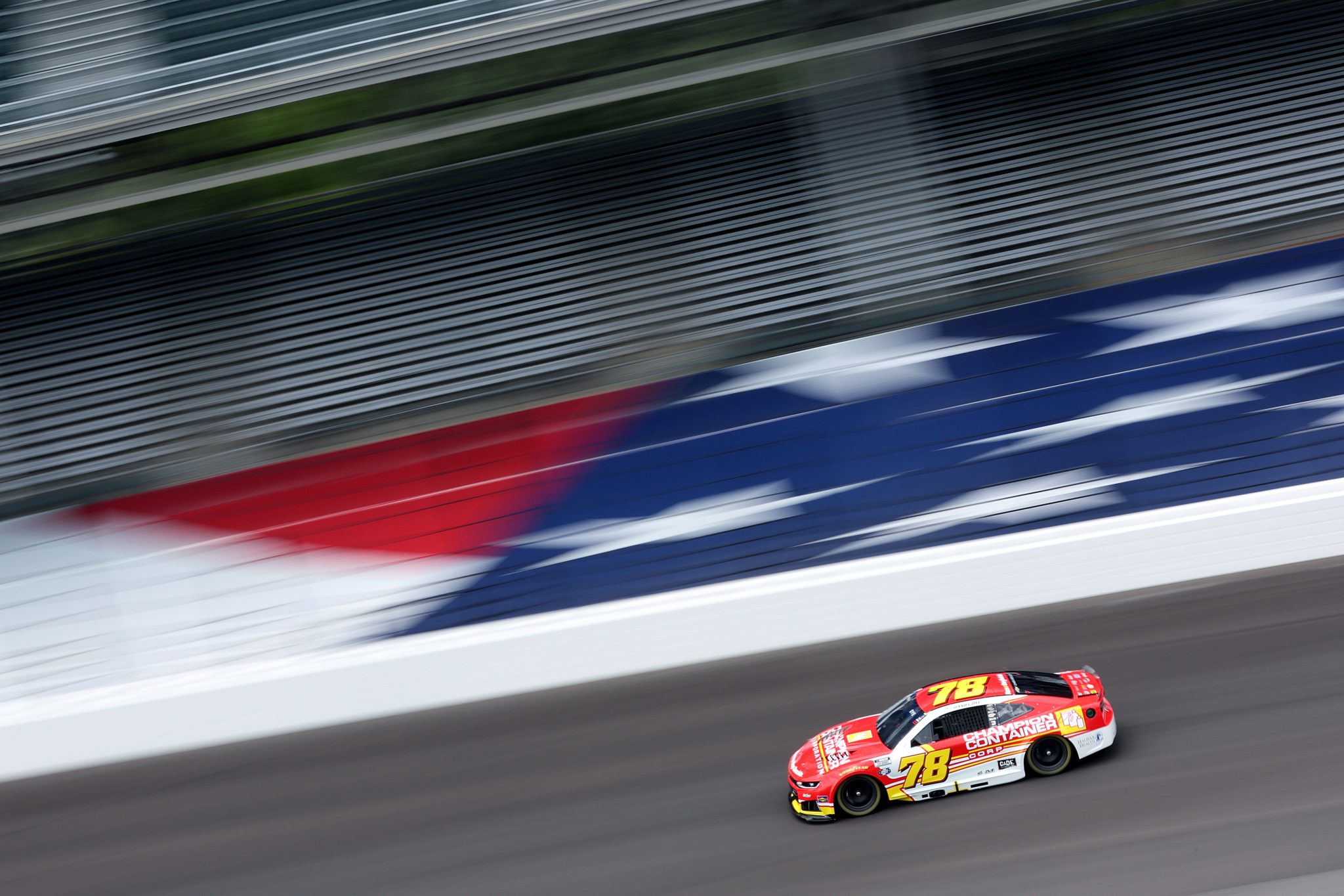 INDIANAPOLIS, INDIANA - JULY 24: Daniel Dye, driver of the #78 Champion Container Corporation Chevrolet, drives during practice for the NASCAR Cup Series Brickyard 400 at Indianapolis Motor Speedway on July 24, 2026 in Indianapolis, Indiana. (Photo by Logan Riely/Getty Images)
