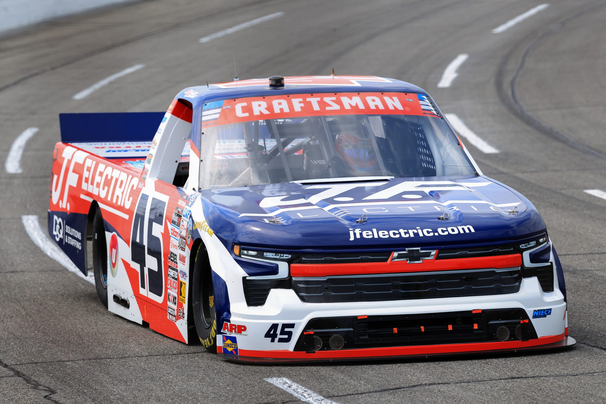 INDIANAPOLIS, INDIANA - JULY 24: Landen Lewis, driver of the #45 J.F. Electric/Utilitra Chevrolet, drives during practice for the NASCAR Craftsman Truck Series TSport 200 at Lucas Oil Indianapolis Raceway Park on July 24, 2026 in Indianapolis, Indiana. (Photo by Justin Casterline/Getty Images) | Getty Images