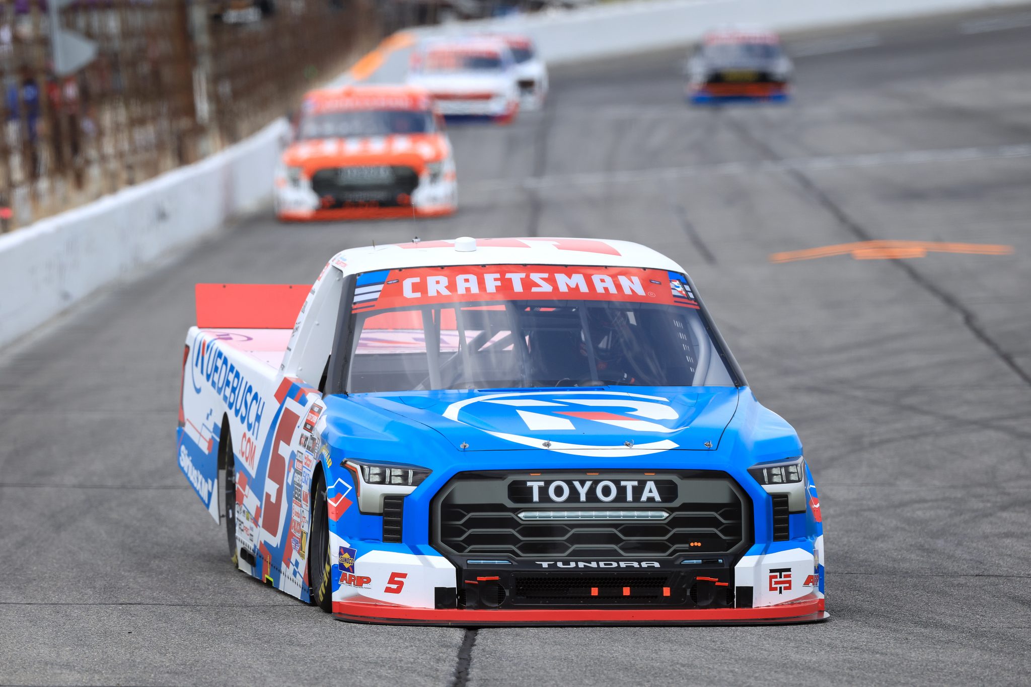 INDIANAPOLIS, INDIANA - JULY 24: Harrison Burton, driver of the #5 Ruedebusch Development & Construction Toyota, drives during practice for the NASCAR Craftsman Truck Series TSport 200 at Lucas Oil Indianapolis Raceway Park on July 24, 2026 in Indianapolis, Indiana. (Photo by Justin Casterline/Getty Images) | Getty Images