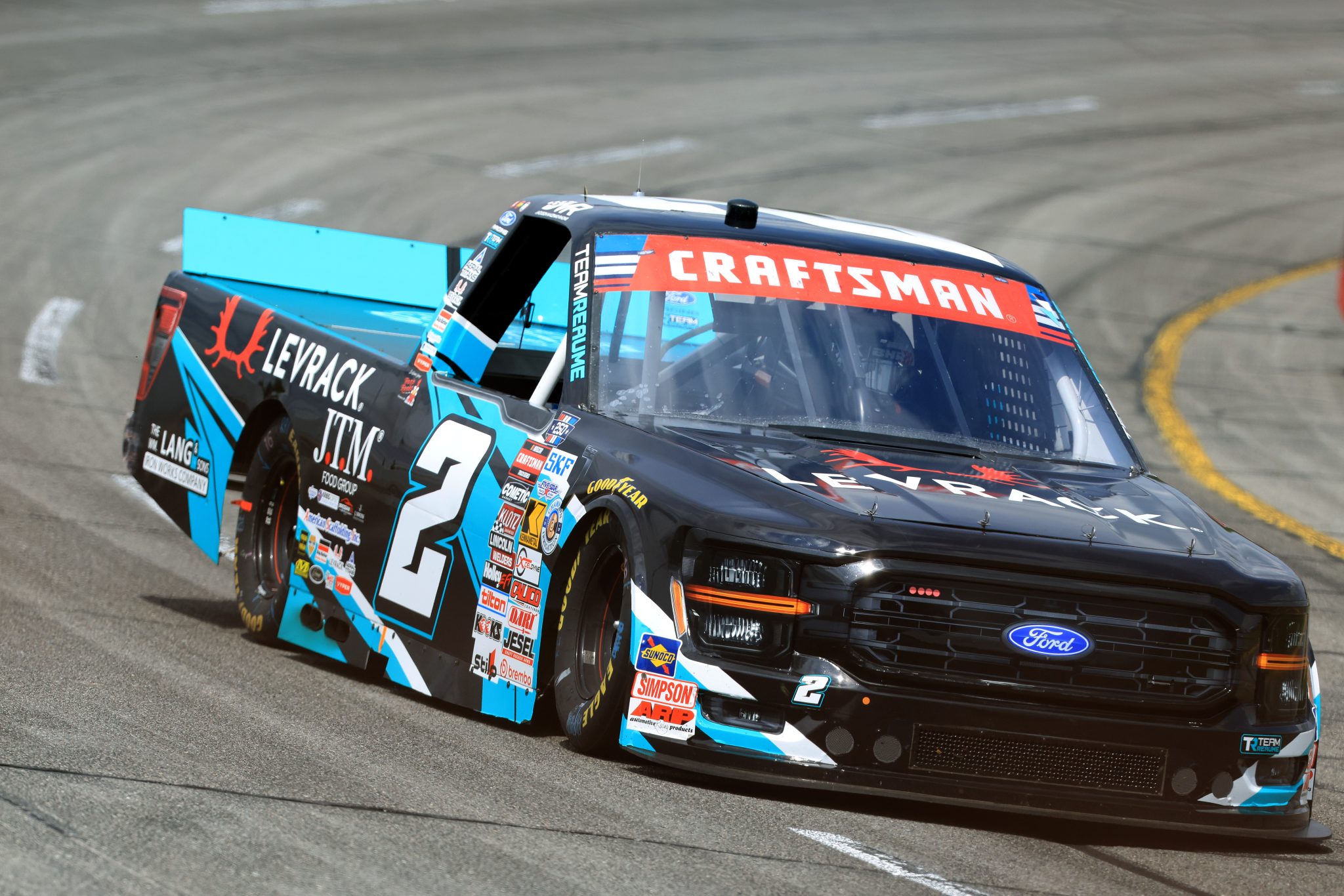 INDIANAPOLIS, INDIANA - JULY 24: Jackson Macenko, driver of the #2 Levrack Ford, drives during qualifying for the NASCAR Craftsman Truck Series TSport 200 at Lucas Oil Indianapolis Raceway Park on July 24, 2026 in Indianapolis, Indiana. (Photo by Justin Casterline/Getty Images) | Getty Images