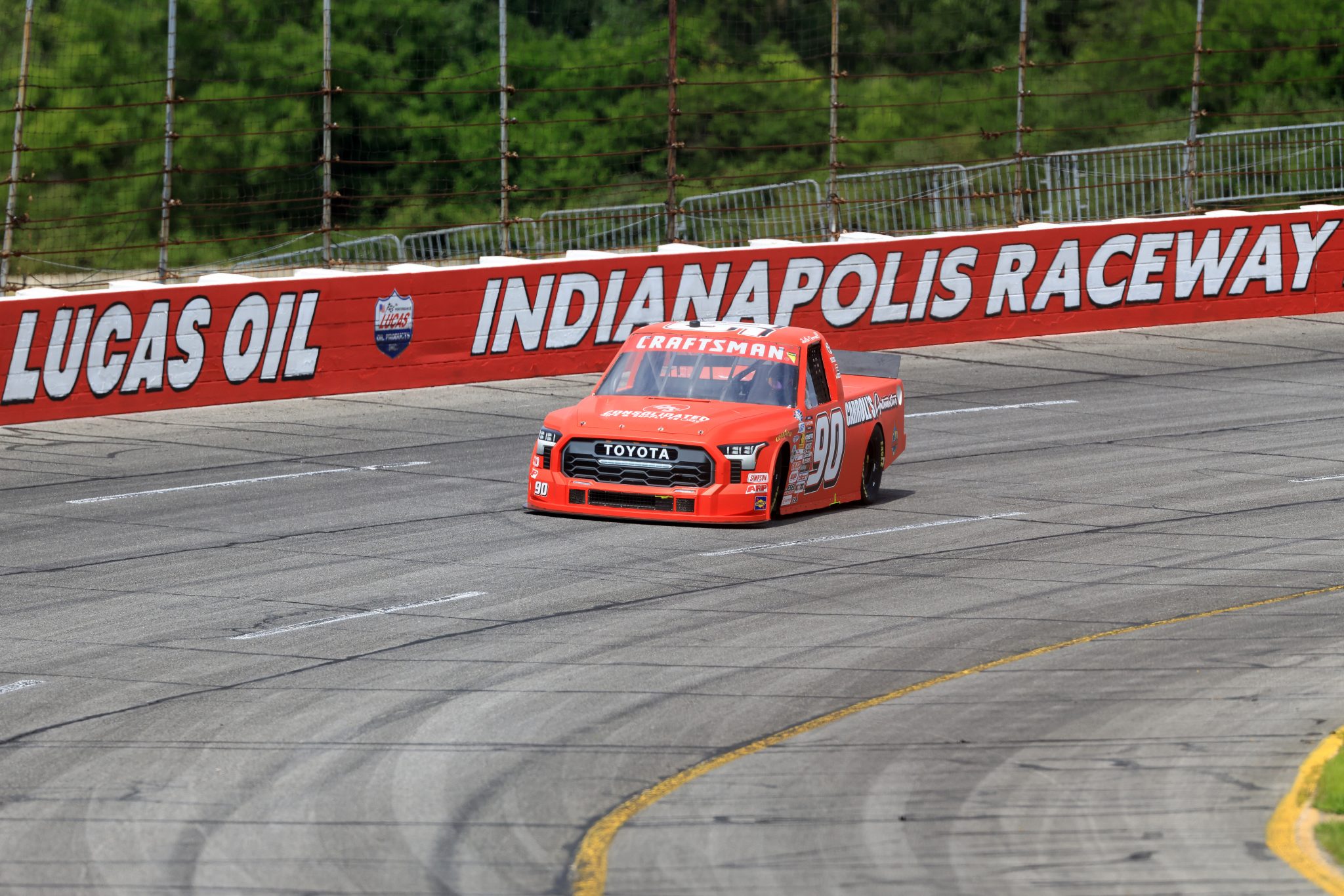 INDIANAPOLIS, INDIANA - JULY 24: Justin Carroll, driver of the #90 Carroll's Automotive Toyota, drives during qualifying for the NASCAR Craftsman Truck Series TSport 200 at Lucas Oil Indianapolis Raceway Park on July 24, 2026 in Indianapolis, Indiana. (Photo by Justin Casterline/Getty Images) | Getty Images